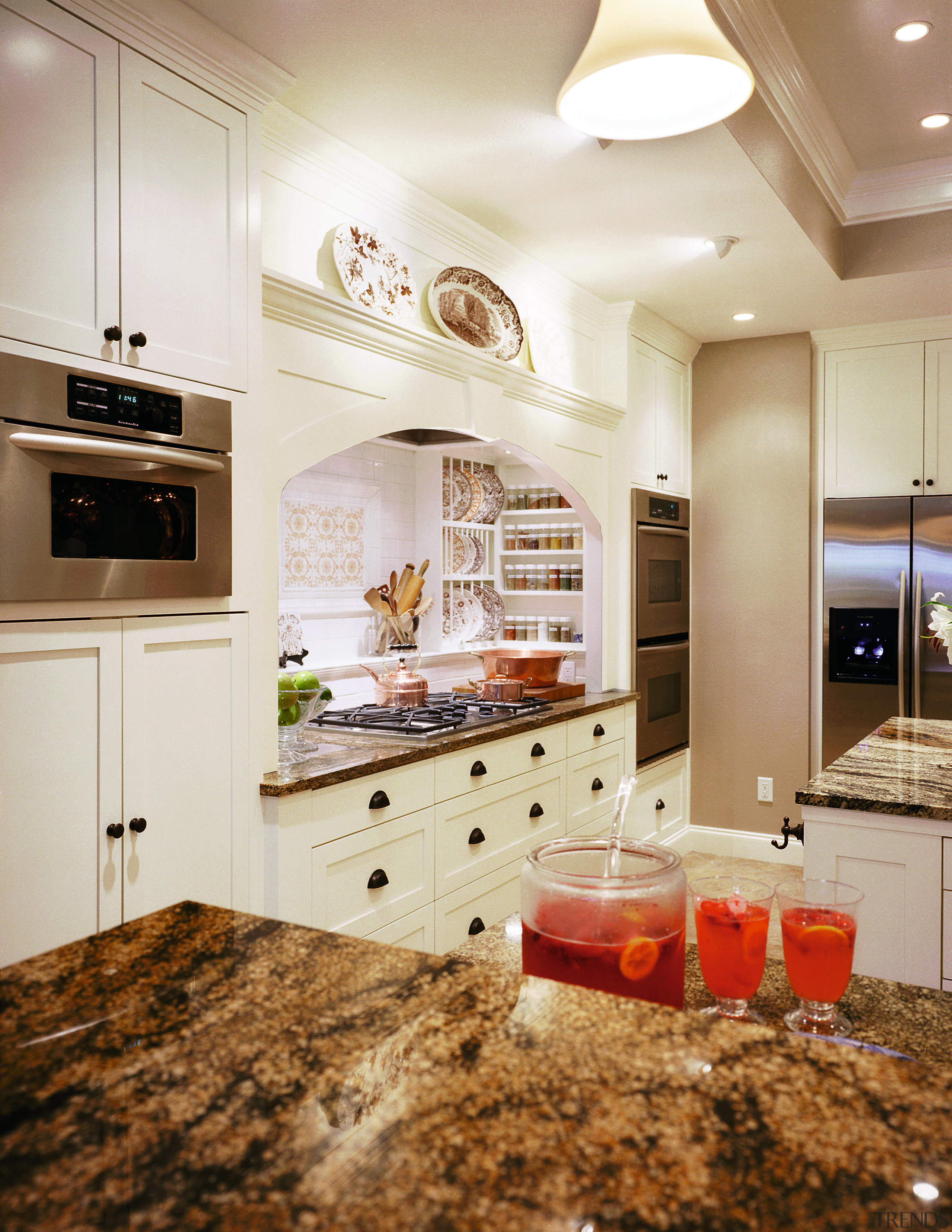 A view of the kitchen area, wooden cabinetry, cabinetry, ceiling, countertop, cuisine classique, floor, flooring, home, interior design, kitchen, room, white, brown