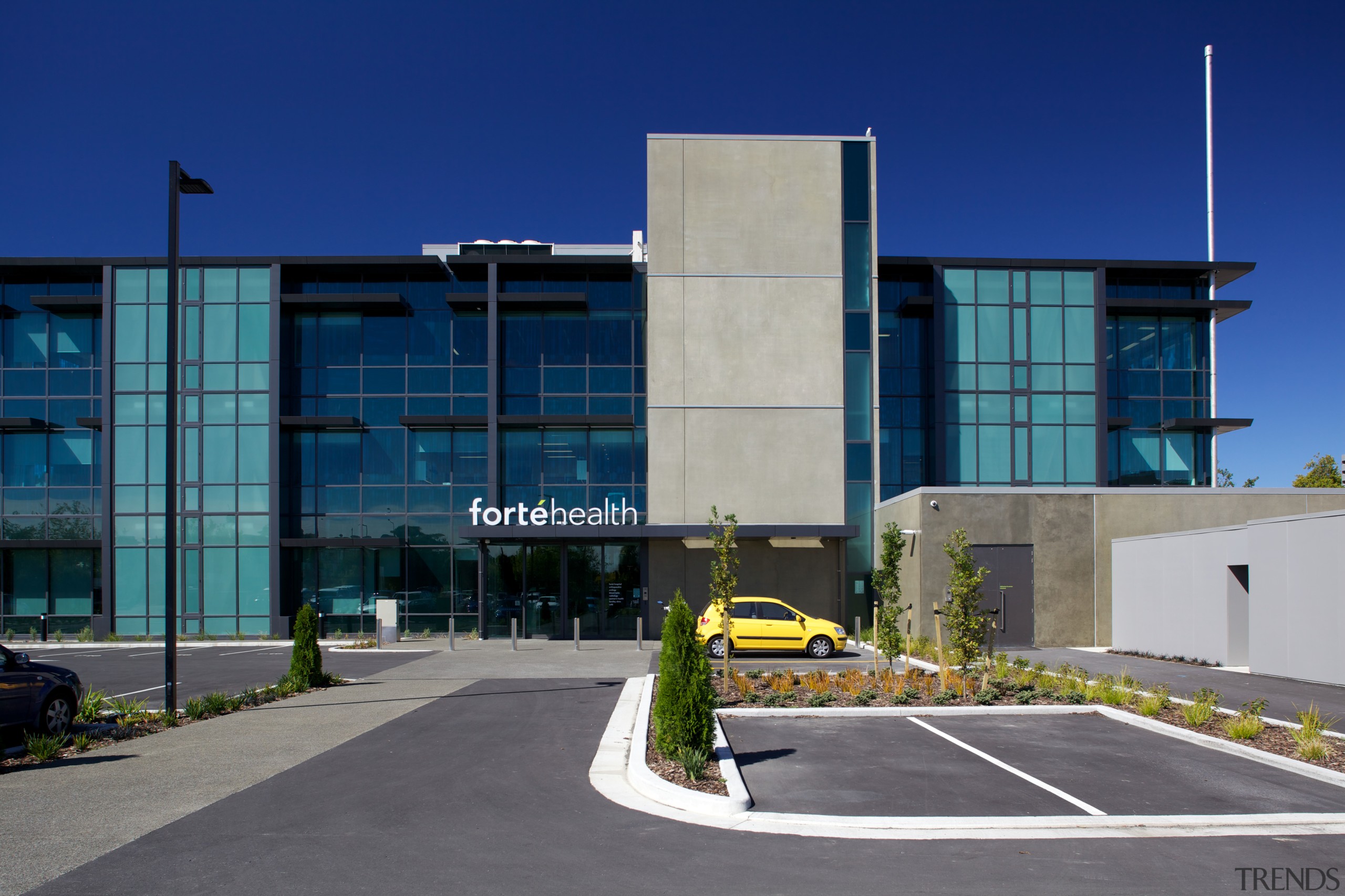 Designed to survive a major seismic event and architecture, building, commercial building, condominium, corporate headquarters, facade, headquarters, metropolitan area, mixed use, real estate, sky, blue, gray