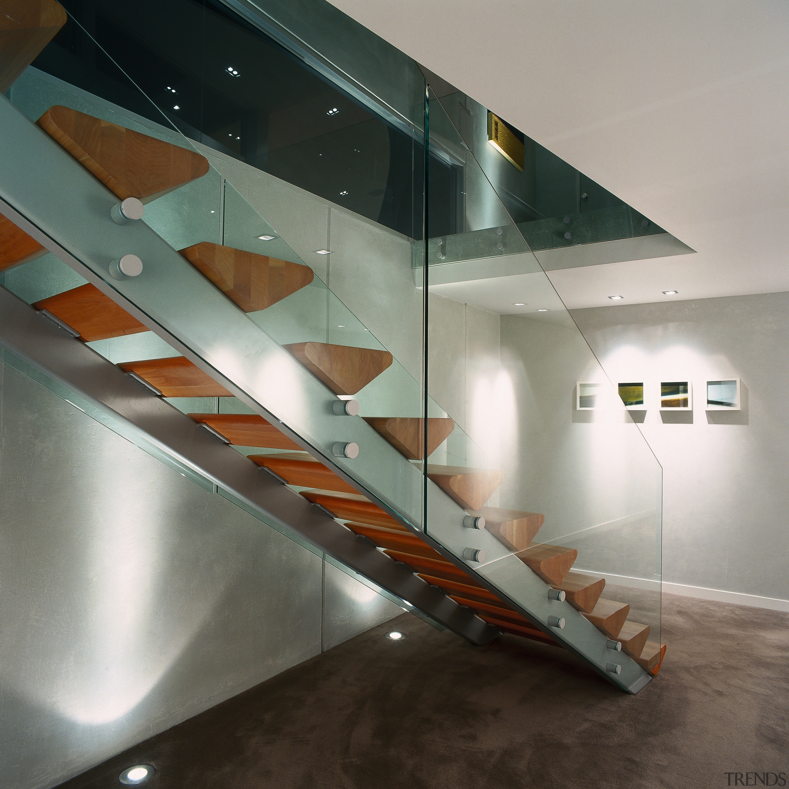 A viewof the glass and wooden staircase, white architecture, ceiling, daylighting, glass, handrail, interior design, product design, stairs, gray, black