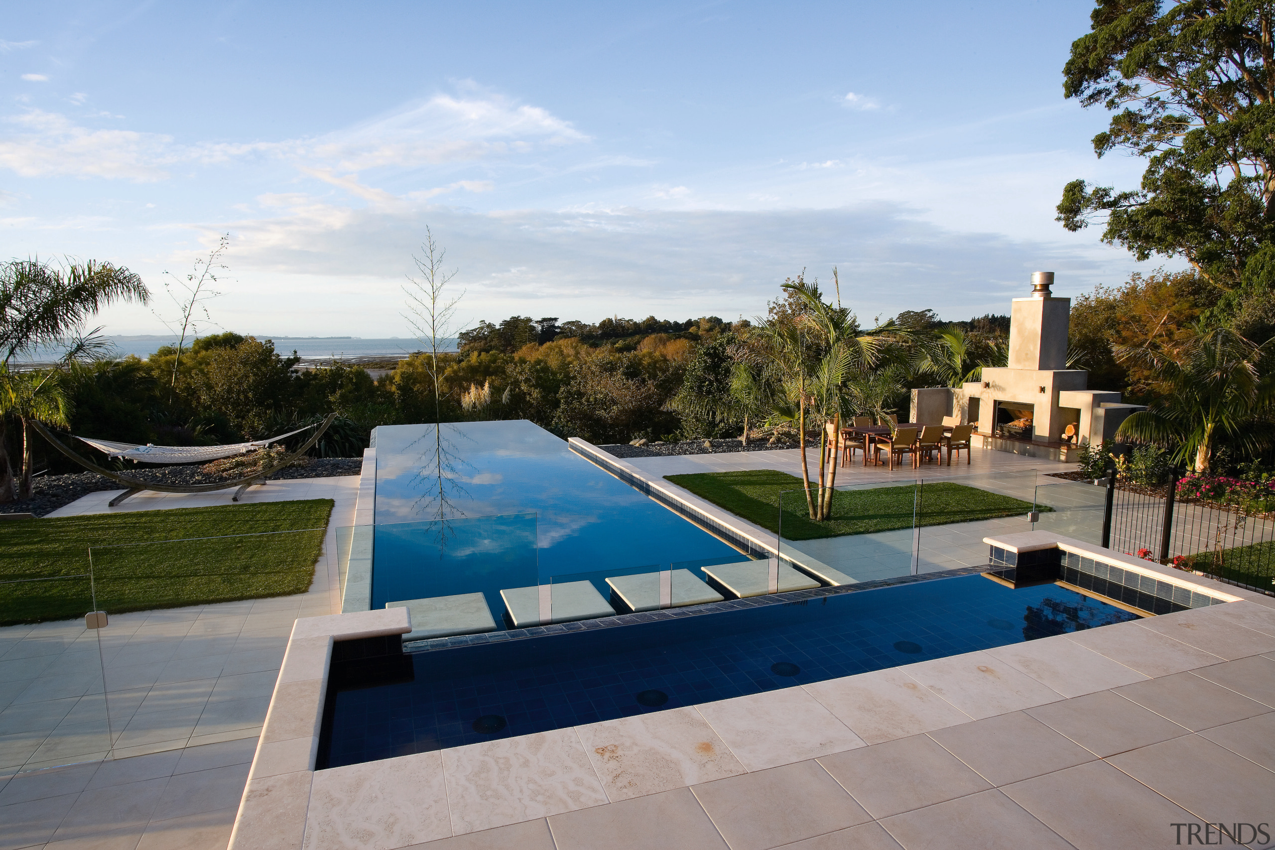 View of this infinity-edge pool built by Frontier architecture, estate, home, house, leisure, property, real estate, residential area, swimming pool, villa, water, gray, teal