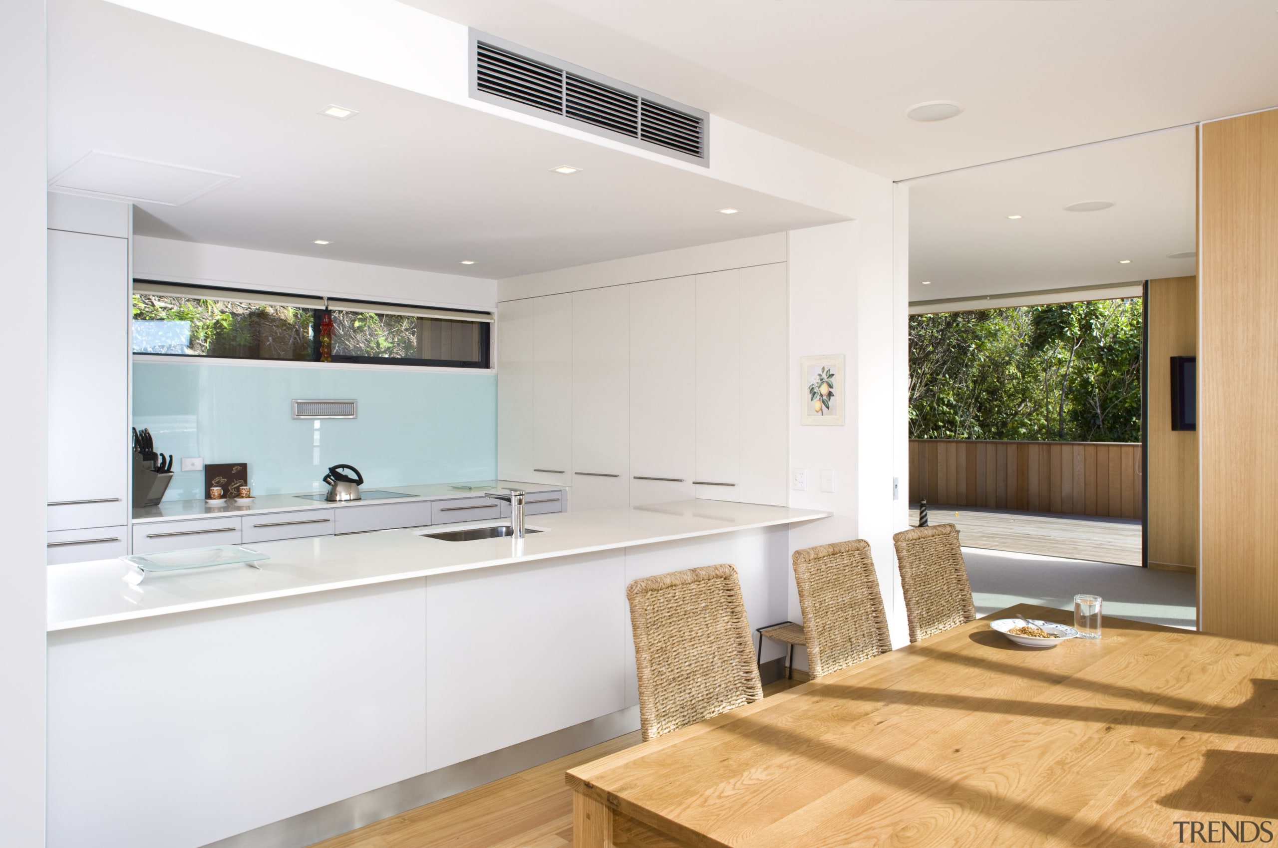 View of the kitchen and dining area with interior design, kitchen, property, real estate, white