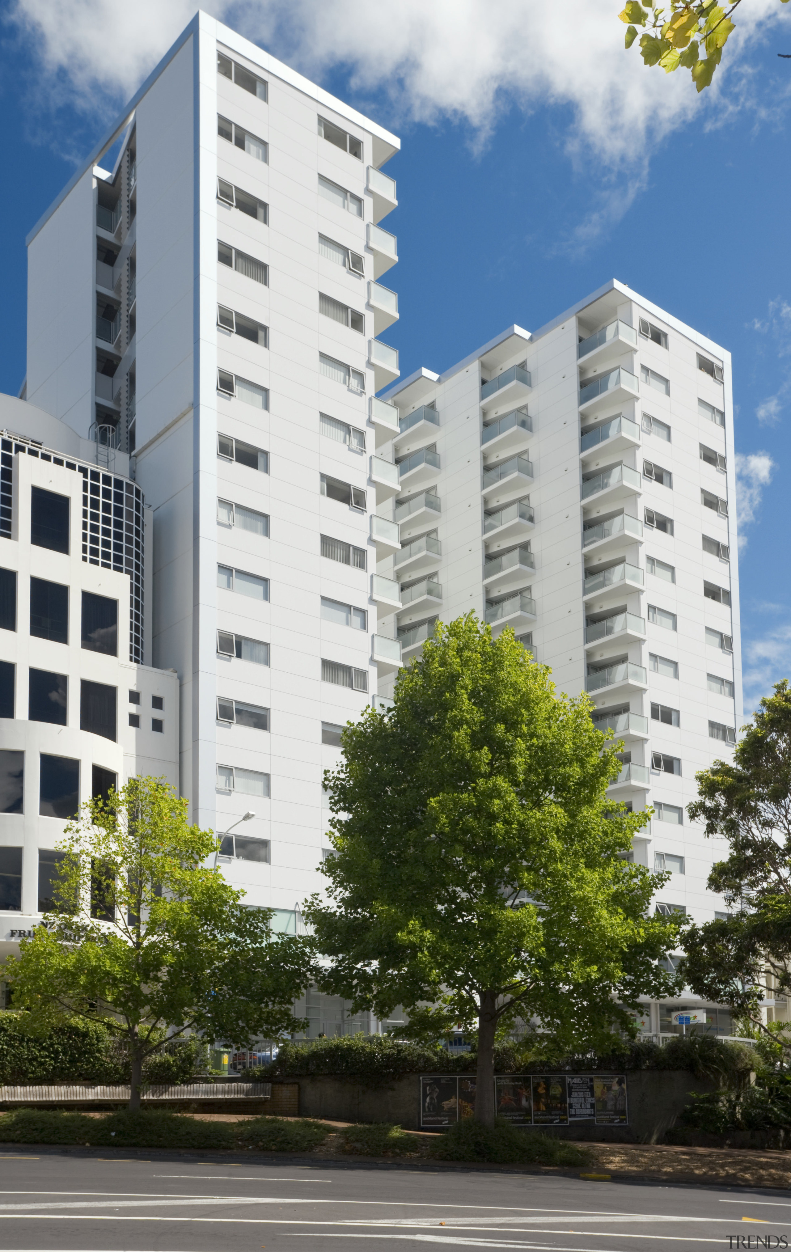 Exterior view of the Federal Apartments which where apartment, architecture, building, city, commercial building, condominium, corporate headquarters, daytime, facade, headquarters, home, house, metropolis, metropolitan area, mixed use, neighbourhood, property, real estate, residential area, sky, skyscraper, tower block, tree, urban area, urban design, white