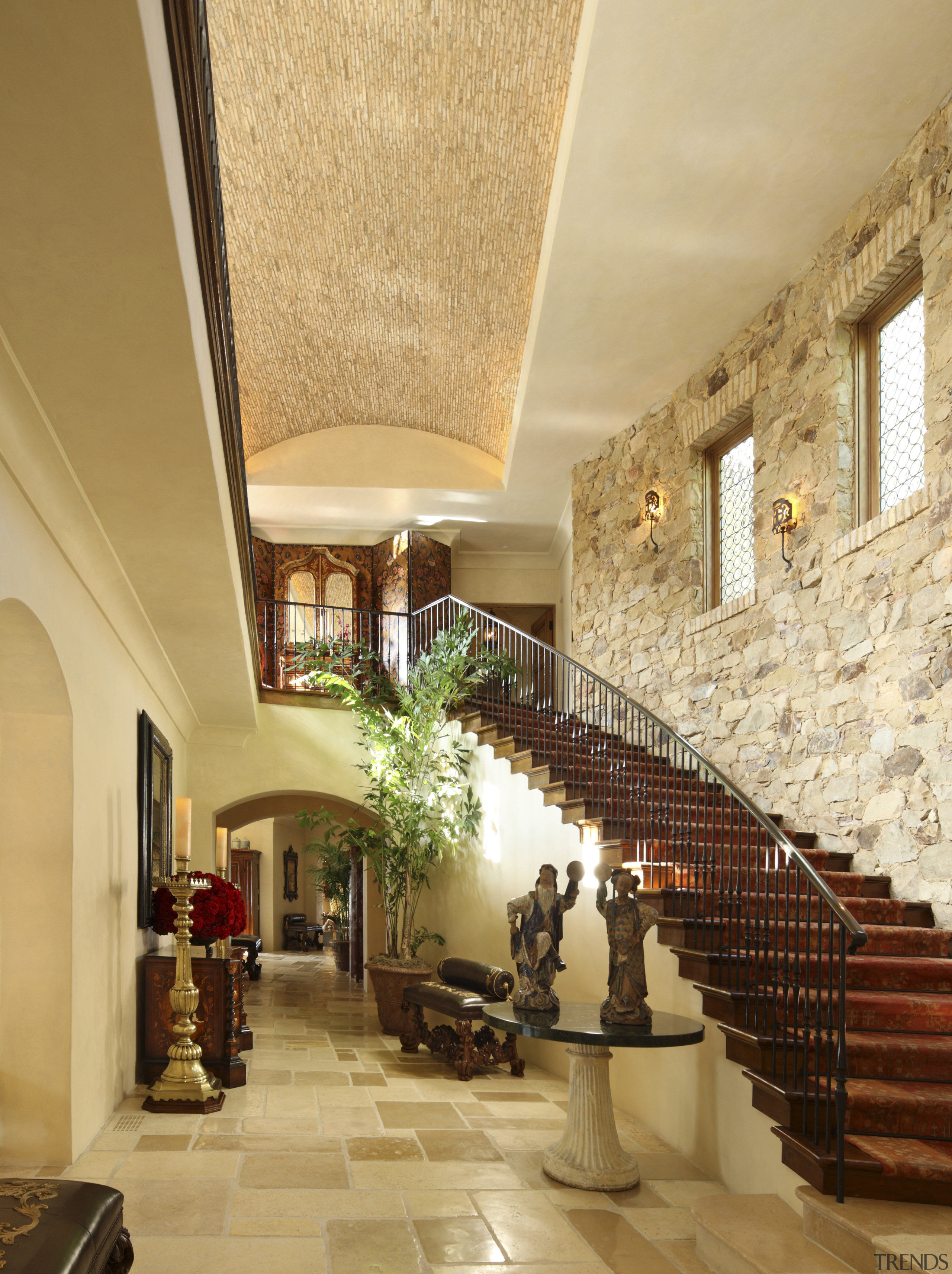 View of stairway with stone wall. - View ceiling, estate, interior design, living room, lobby, real estate, stairs, orange, brown