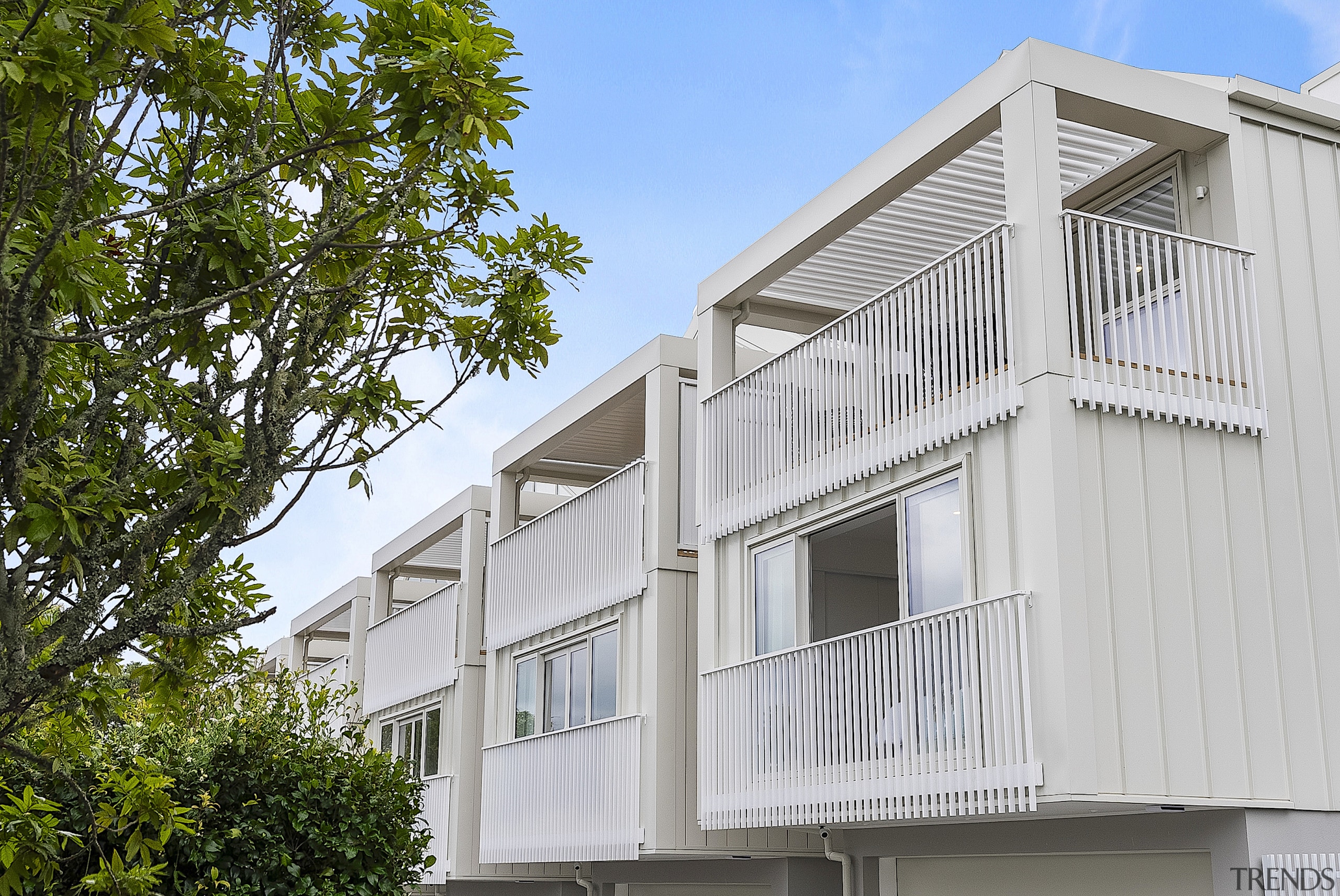 The tall yet understated exterior of the townhouses 