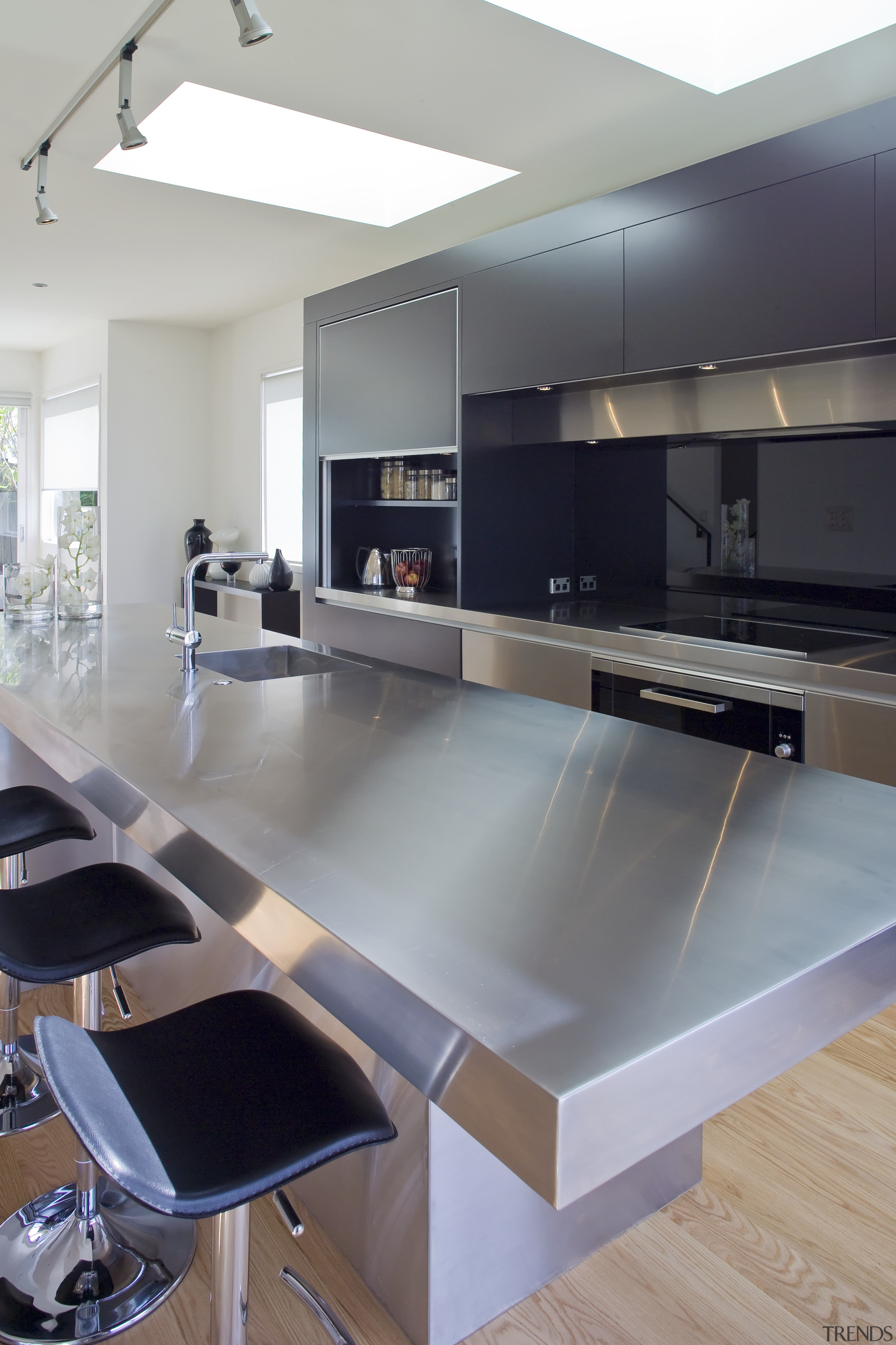 Mitred edges on the benchtop and base soften architecture, countertop, floor, furniture, glass, interior design, kitchen, product design, table, gray