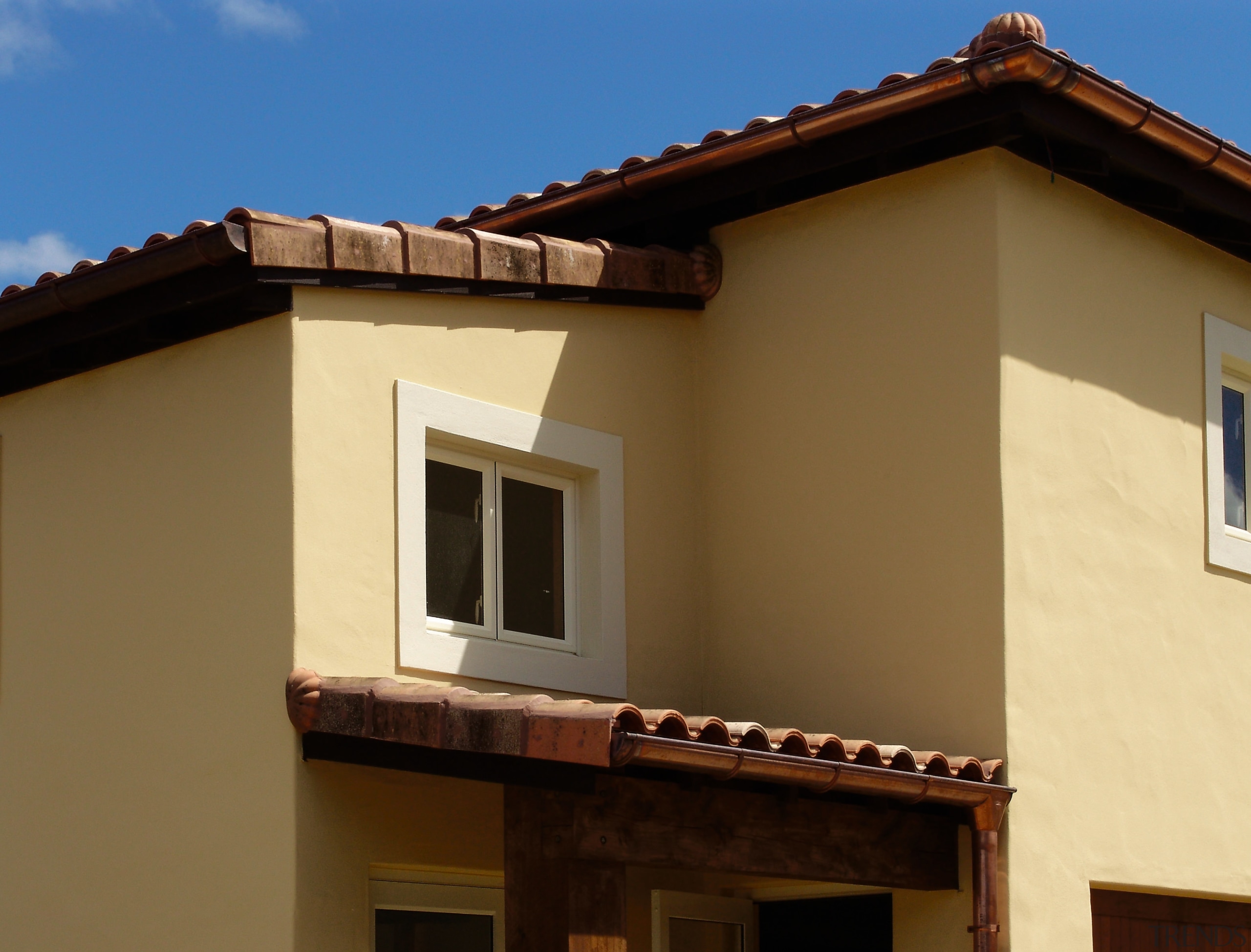 A view of a home using Epana Ceramica. architecture, balcony, building, daylighting, elevation, estate, facade, home, house, property, real estate, residential area, roof, siding, sky, wall, window, brown