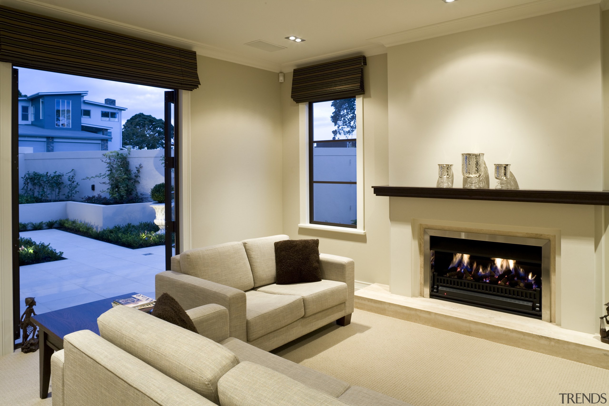 View of a living area inside this Mediterranean-style ceiling, estate, hearth, home, interior design, living room, property, real estate, room, wall, window, orange, brown