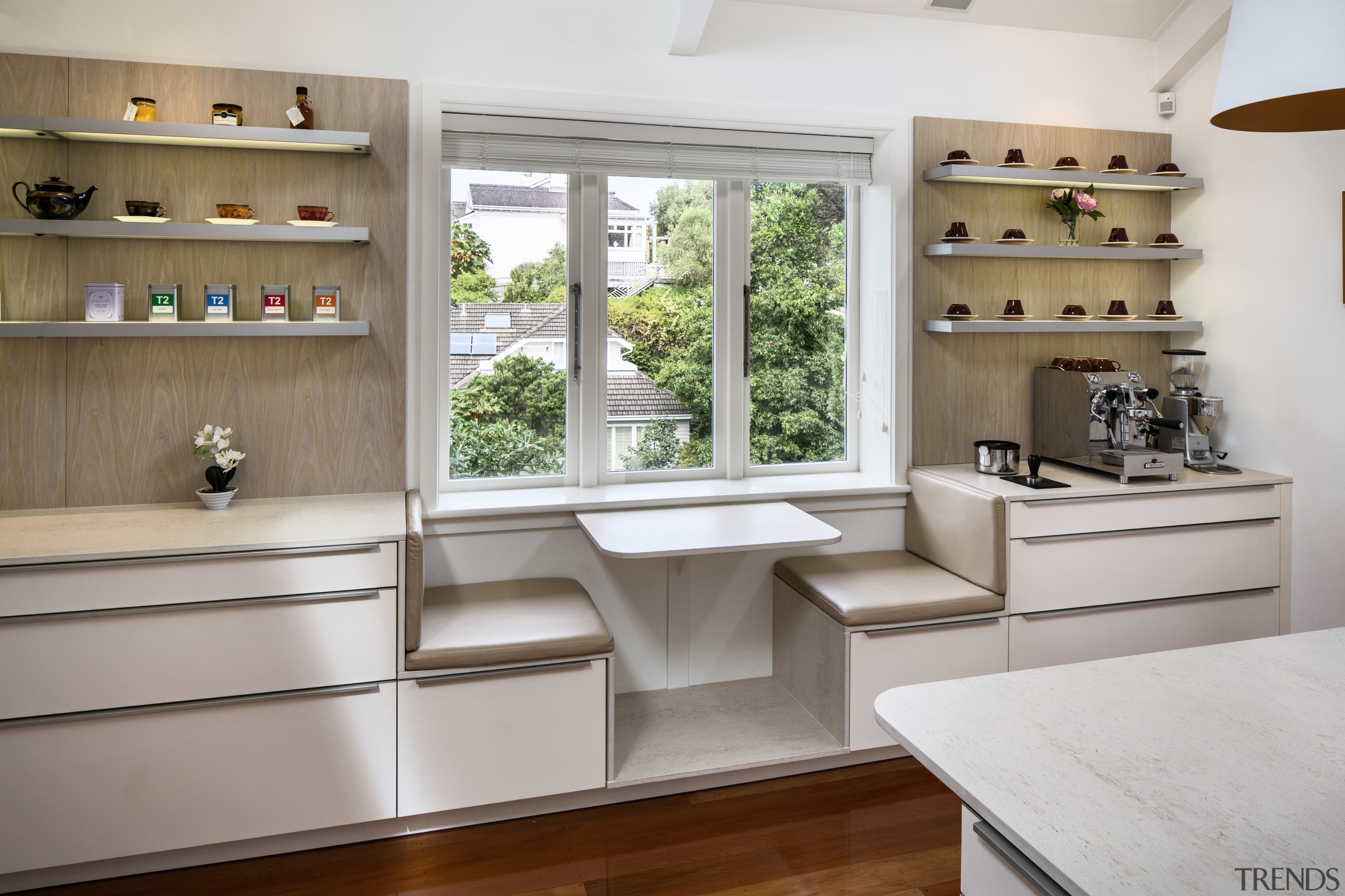 ​​​​​​​In this kitchen by designer Damian Hannah, a cabinetry, benchtop, interior design, kitchen, shelf, coffee nook, Damien Hannah