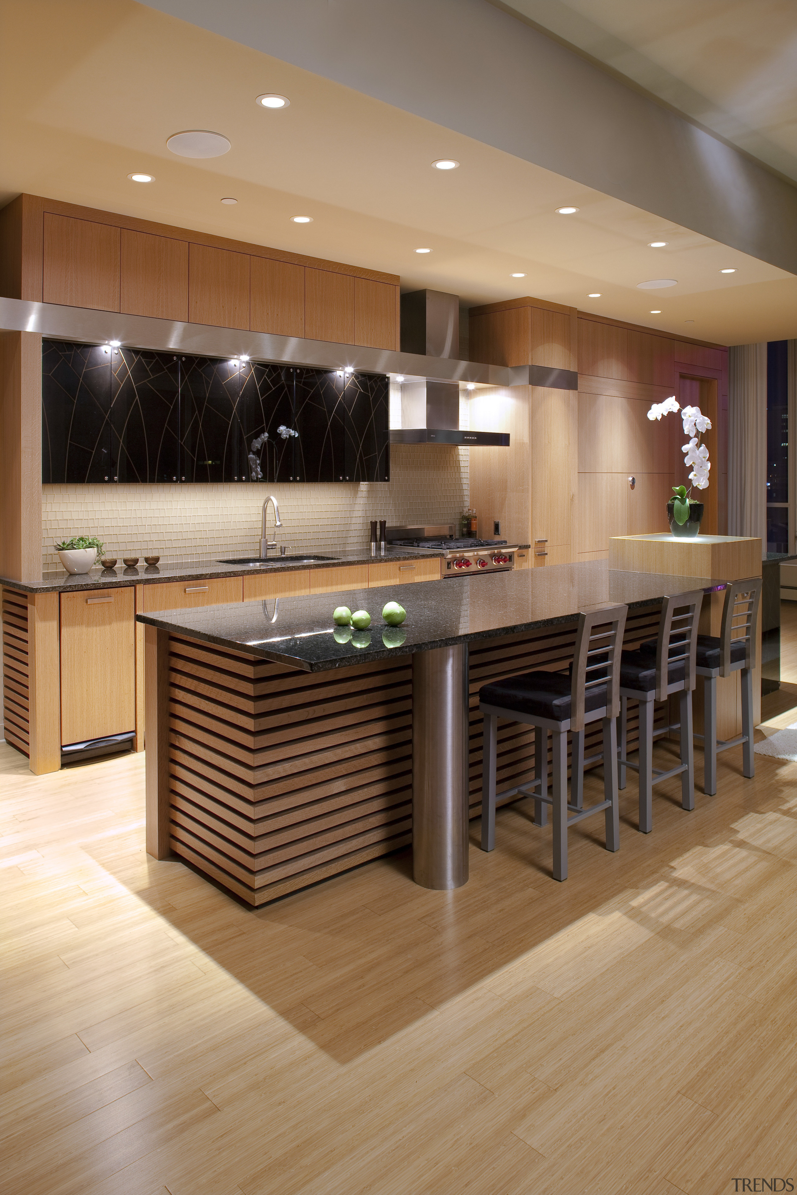 View of contemporary kitchen with wooden features and cabinetry, countertop, floor, flooring, hardwood, interior design, kitchen, laminate flooring, table, wood, wood flooring, orange, brown