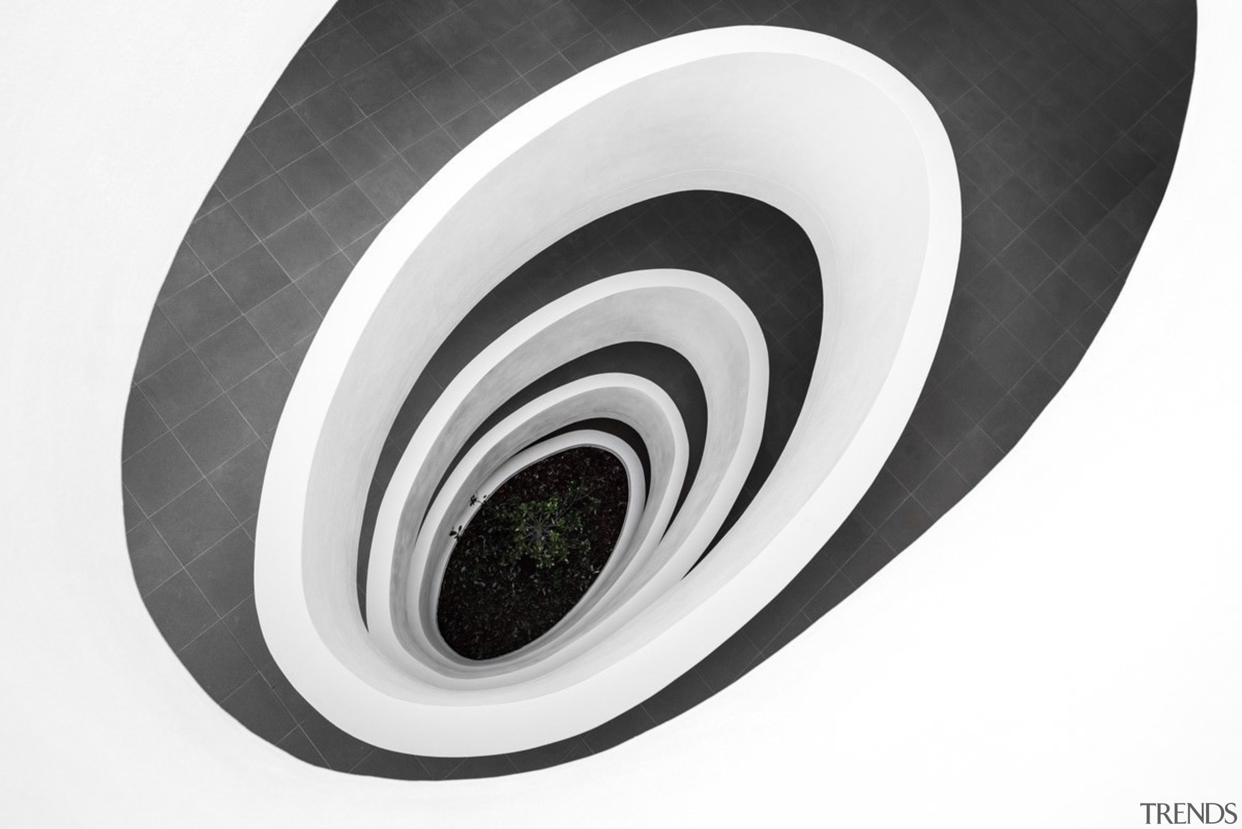 This ramp spirals down to the ground floor automotive tire, black and white, product, product design, wheel, white