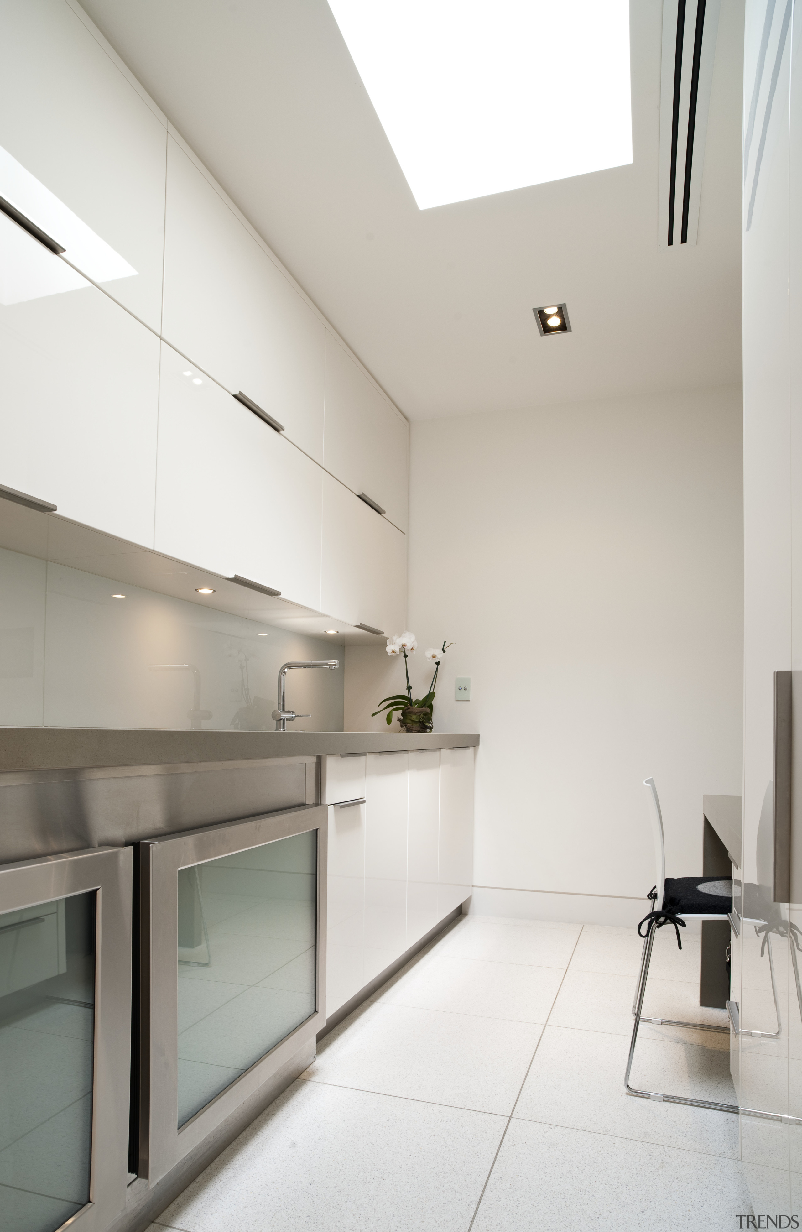 View of contemporary kitchen with light toned cabinetry architecture, countertop, daylighting, floor, interior design, kitchen, product design, real estate, room, white