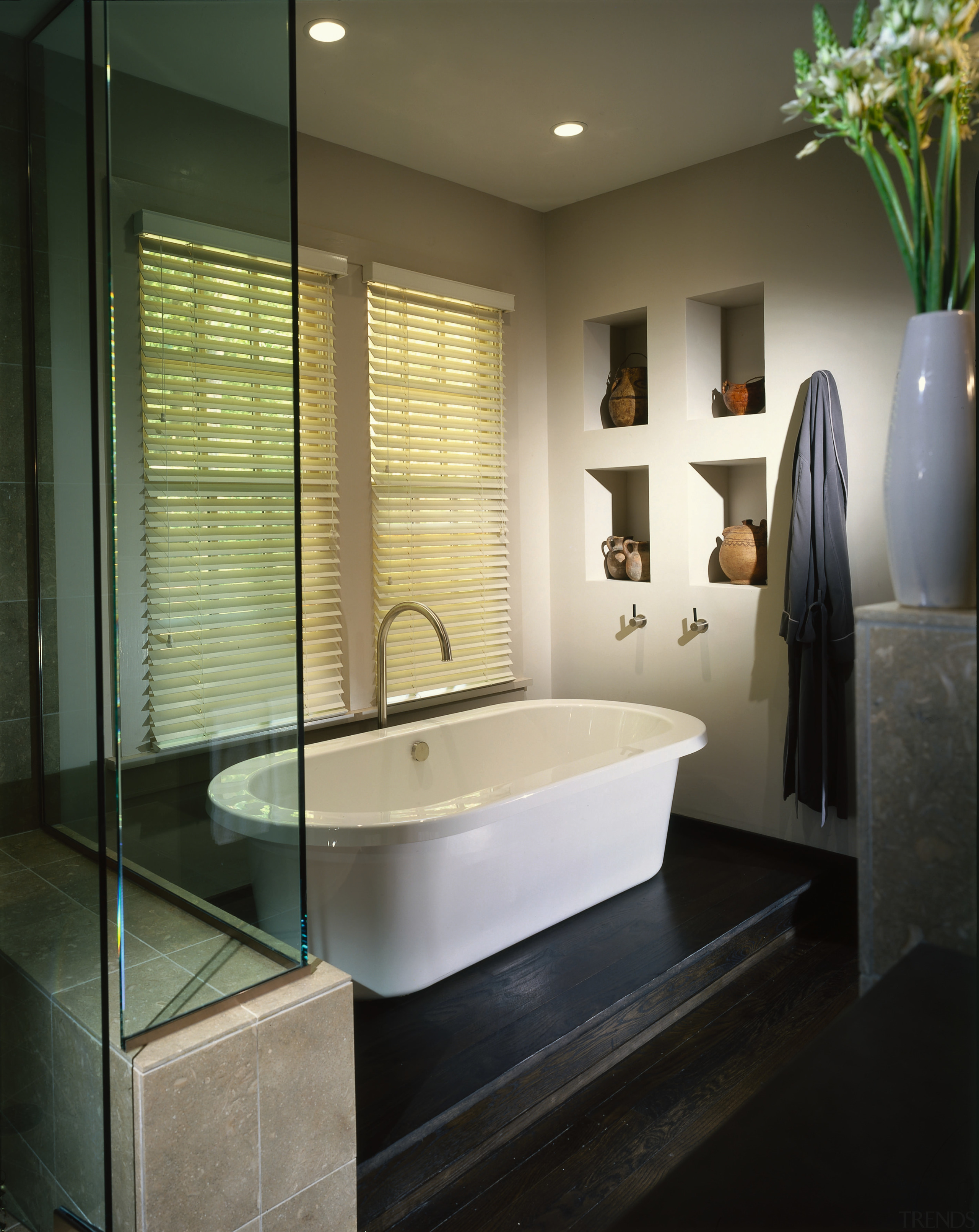 Bathroom with white tub, dark timber flooring, cubbyholes bathroom, bathtub, ceiling, floor, flooring, interior design, plumbing fixture, room, black, gray