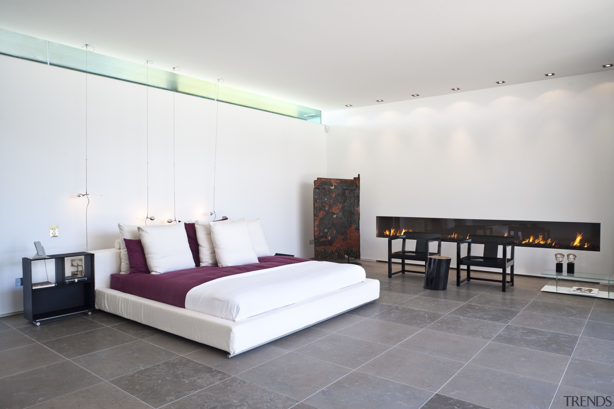 Contemporary bedroom with floor tiles and fireplace architecture, bed frame, bedroom, ceiling, floor, furniture, interior design, real estate, room, suite, wall, white, gray