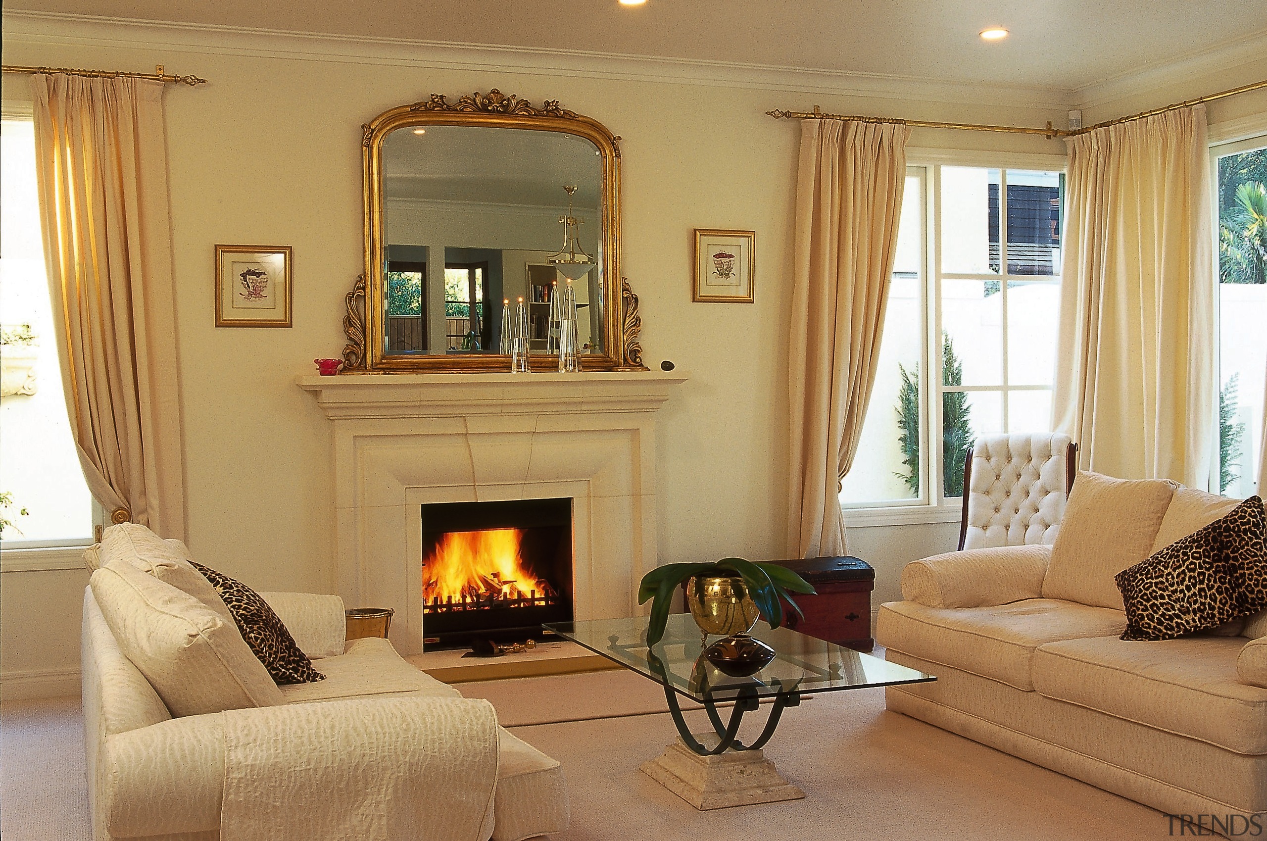 Lounge room with fire set into cream fire ceiling, estate, fireplace, hearth, home, interior design, living room, property, real estate, room, window, window treatment, wood burning stove, orange, brown