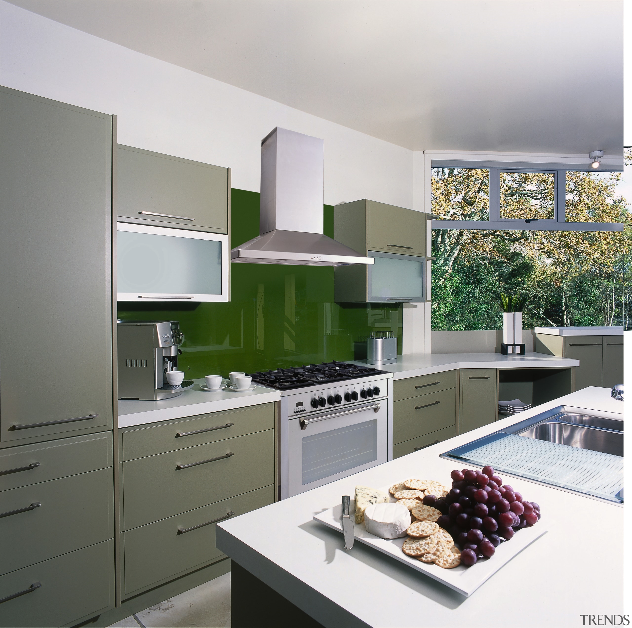 A view of a kitchen, polished concrete tiled countertop, cuisine classique, home appliance, interior design, kitchen, gray, white
