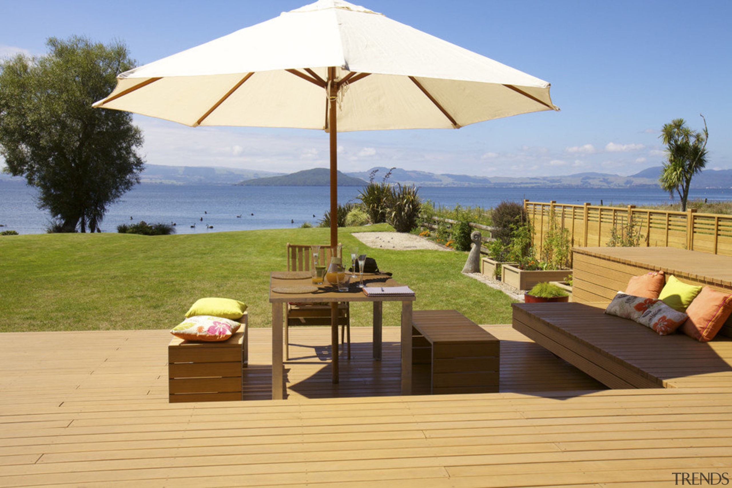 Outdoor living products made of radiata pine from deck, estate, furniture, home, leisure, outdoor furniture, outdoor structure, property, real estate, resort, shade, sunlounger, table, umbrella, vacation, orange, brown