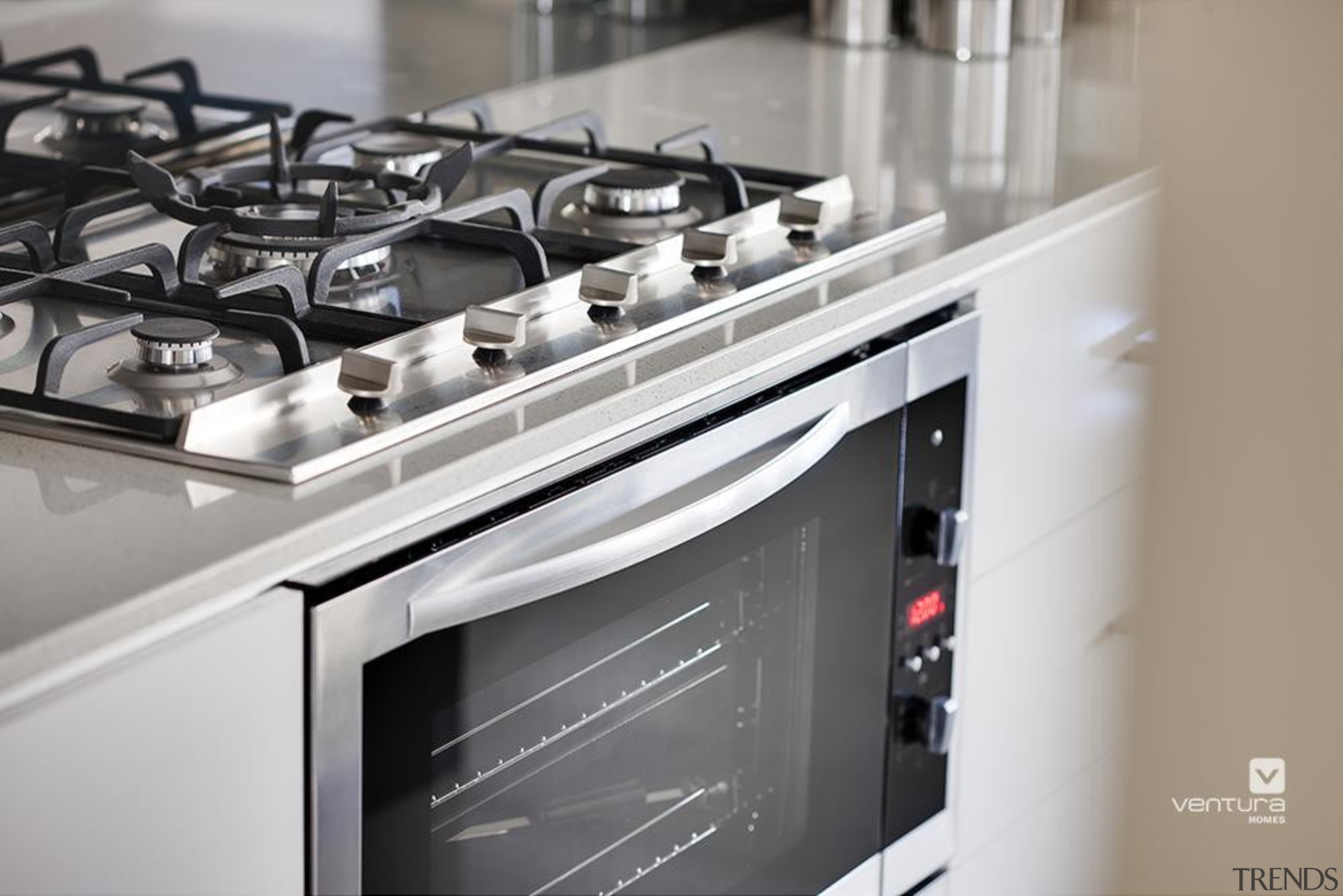 Kitchen design. - The New Dimension Display Home countertop, gas stove, home appliance, kitchen, kitchen appliance, kitchen stove, major appliance, gray