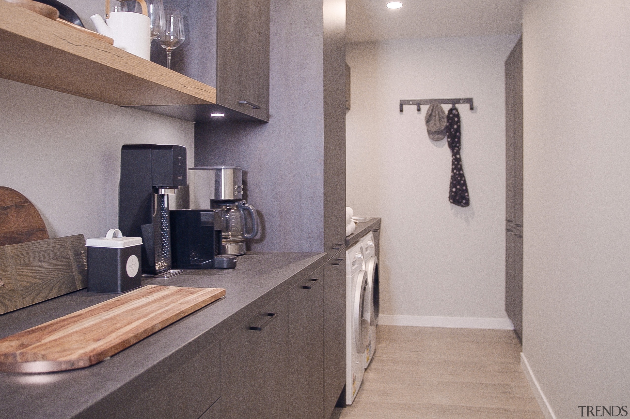 The laundry area runs on from the kitchen. 