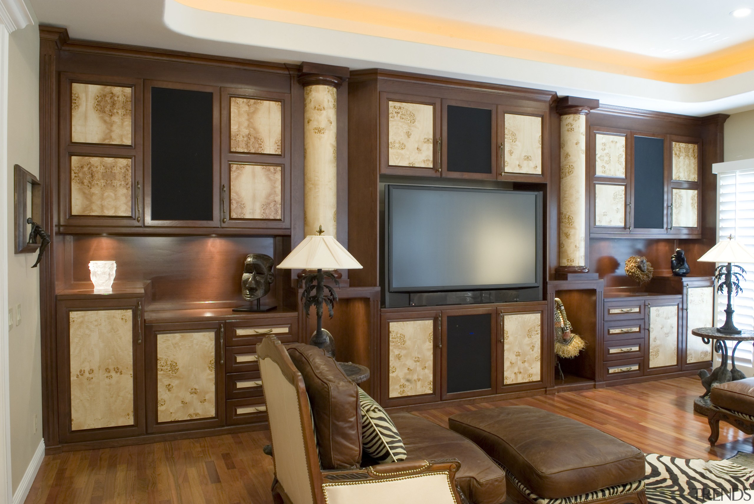 Cabinetry in the entertainment room is cherry and cabinetry, ceiling, furniture, home, interior design, living room, real estate, room, wall, window, brown