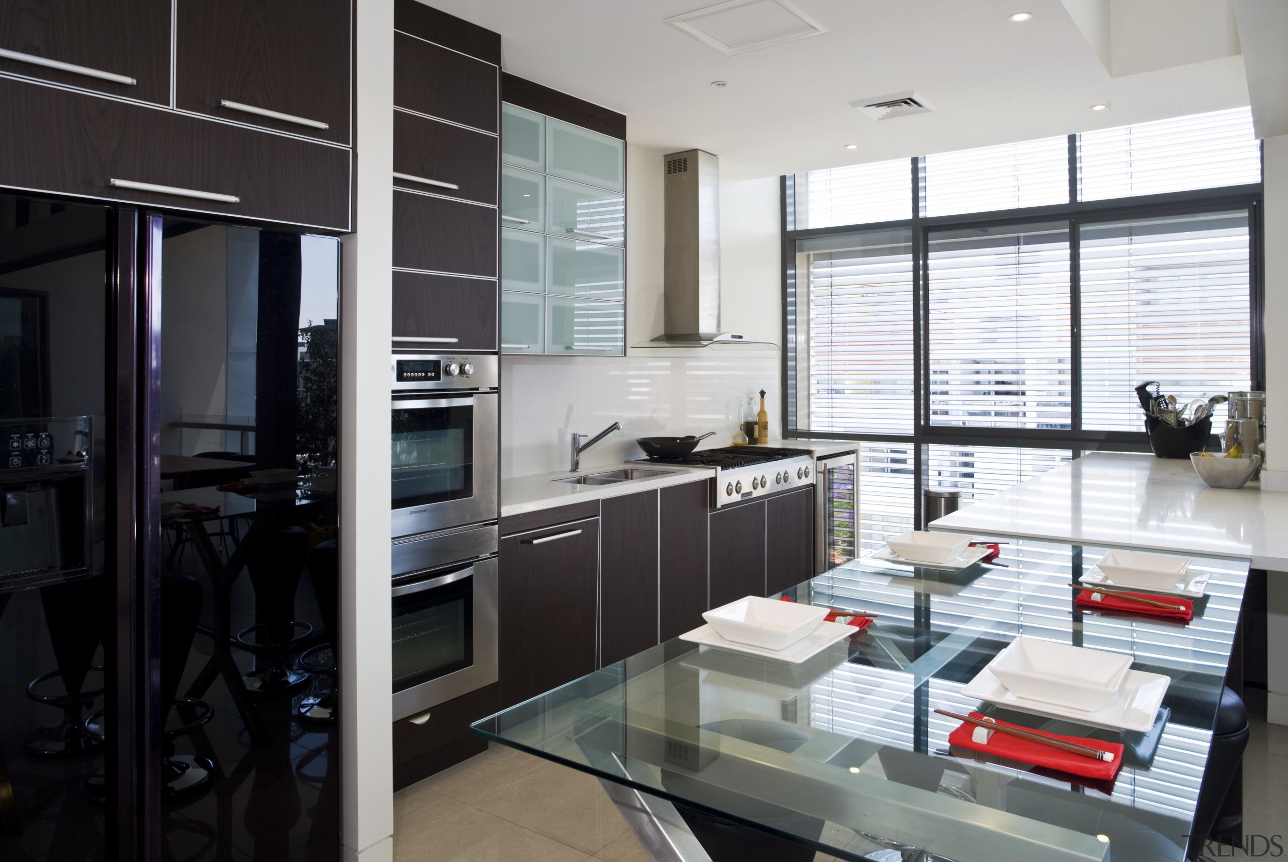 View of a custom-designed kitchen which features a countertop, interior design, kitchen, black, white