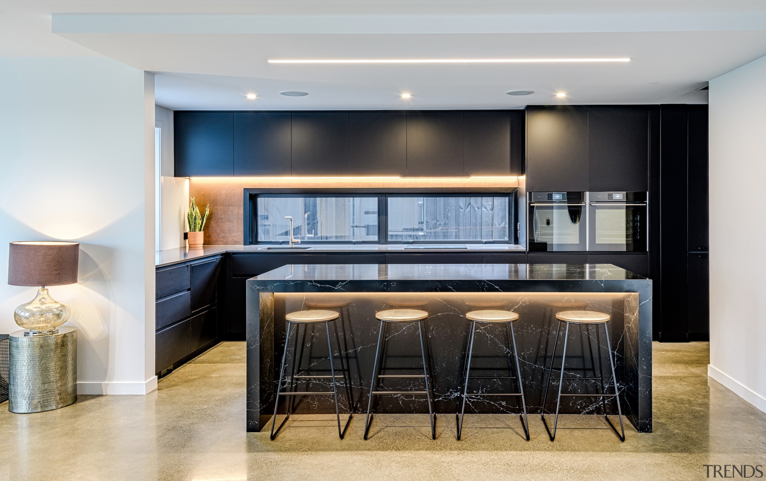 Designer Kirsty Davis created a minimal, balanced kitchen architecture, building, cabinetry, ceiling, countertop, floor, flooring, furniture, home, house, interior design, kitchen, lighting, living room, material property, property, real estate, room, table, gray