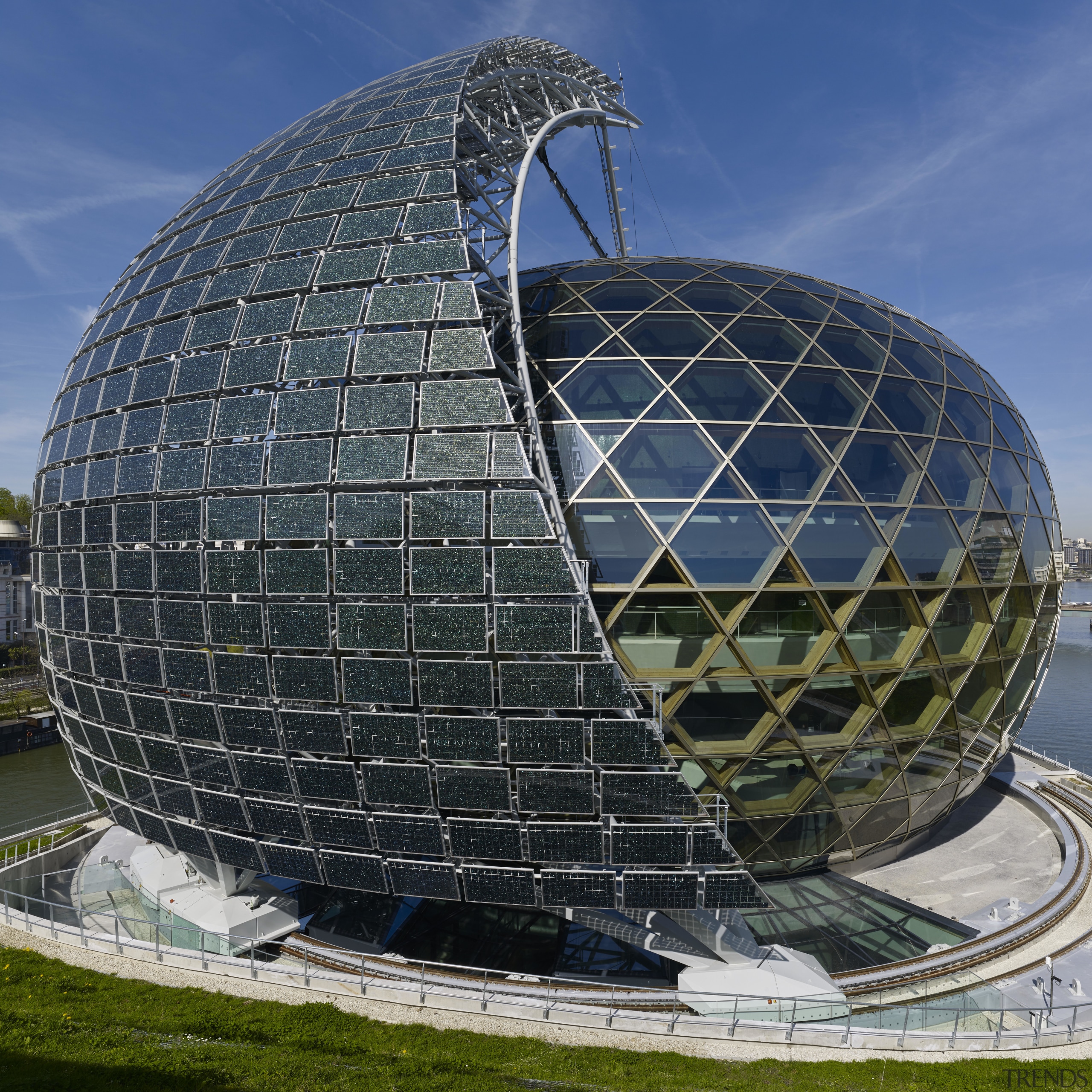 A sail comprised of solar panels appears to architecture, biome, building, dome, landmark, sky, sphere, black