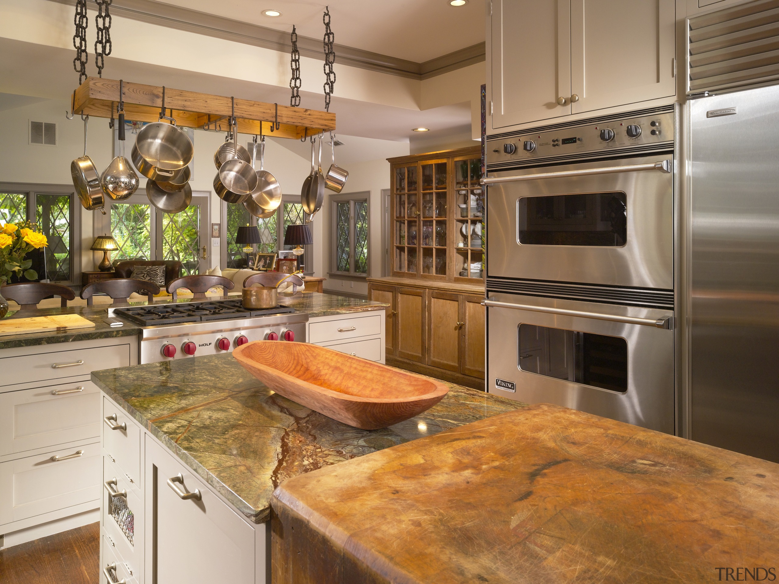 View of remodeled kitchen with rainforest green marble cabinetry, countertop, cuisine classique, interior design, kitchen, brown, orange