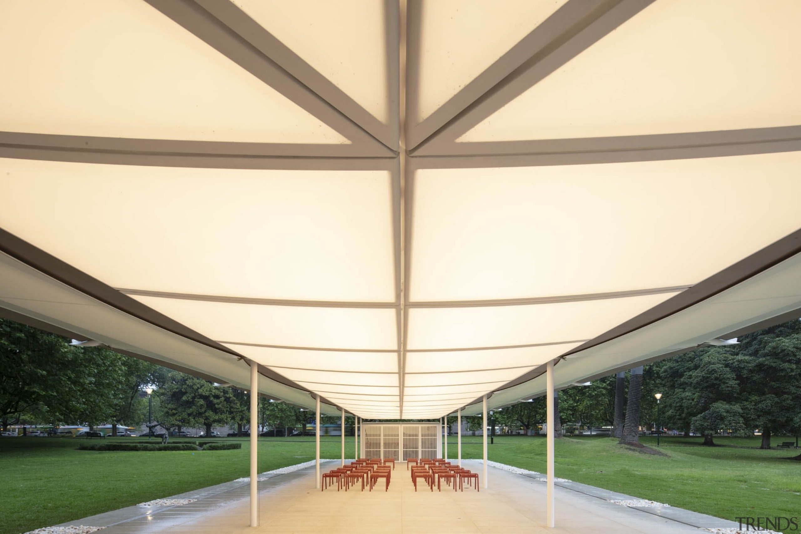 The MPavilion consists of a rectangular plan and architecture, building, canopy, ceiling, daylighting, grass, infrastructure, pavilion, roof, shade, walkway, yellow