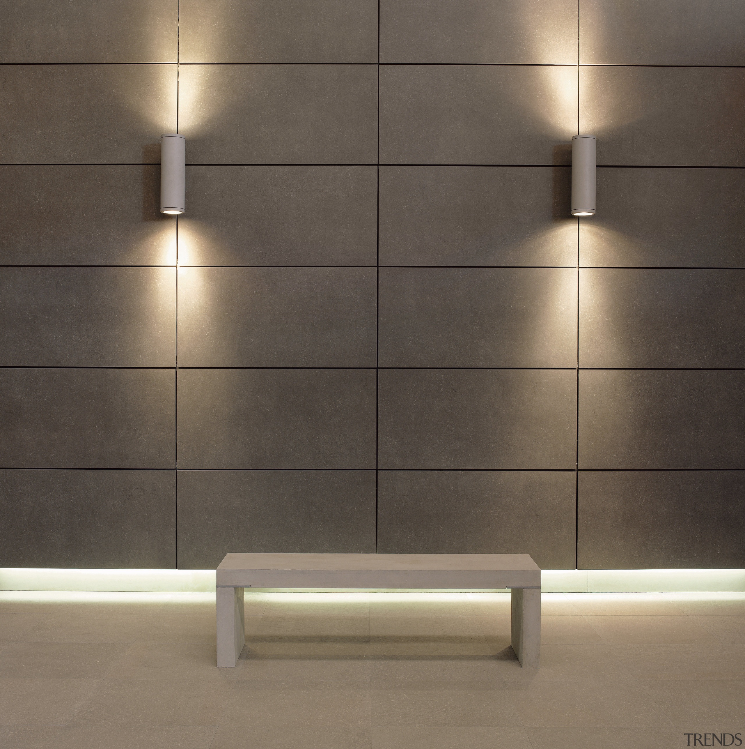 A view of a tiled wall. - A ceiling, floor, flooring, light, light fixture, lighting, product design, tile, wall, gray