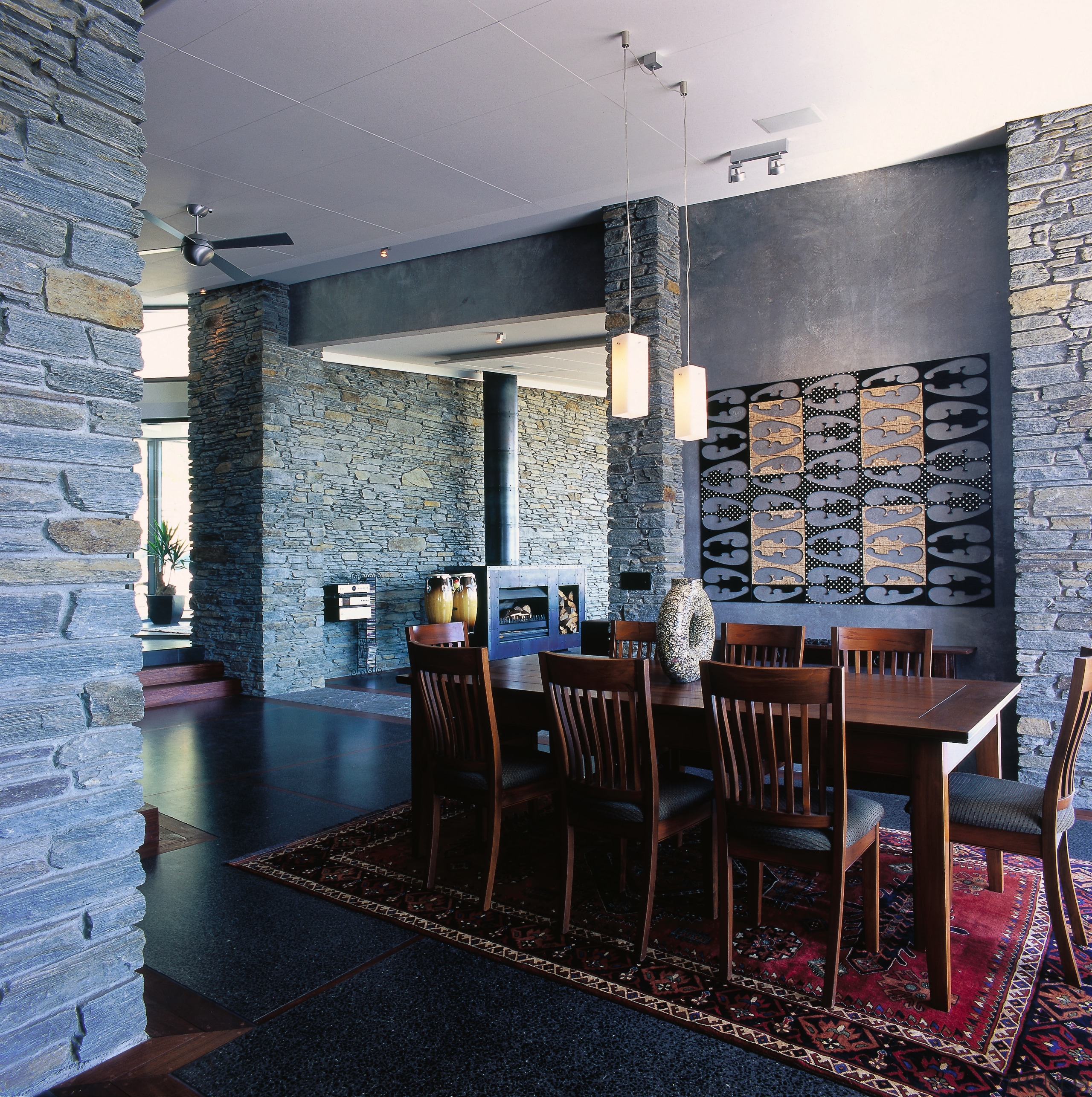 view of this living area featuring polished concrete architecture, interior design, wall, black, gray