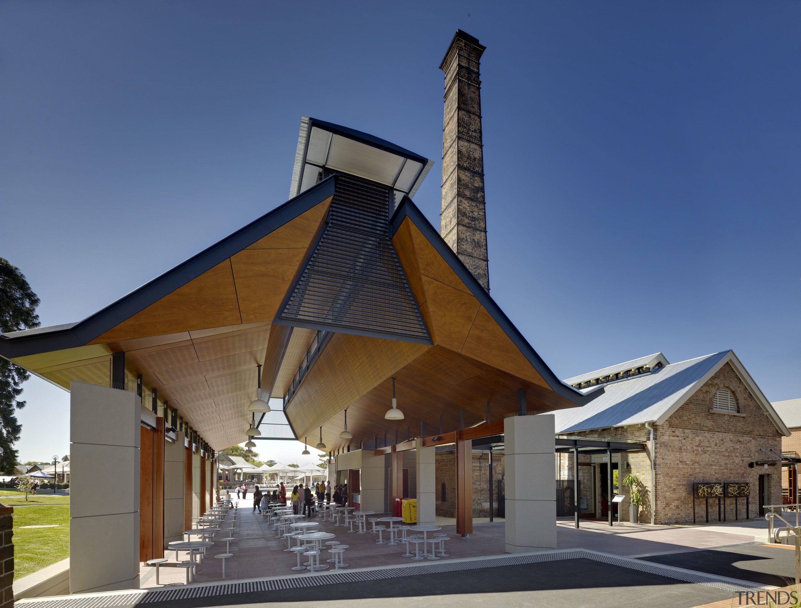 View of outdoor seating area. - View of architecture, building, house, roof, blue