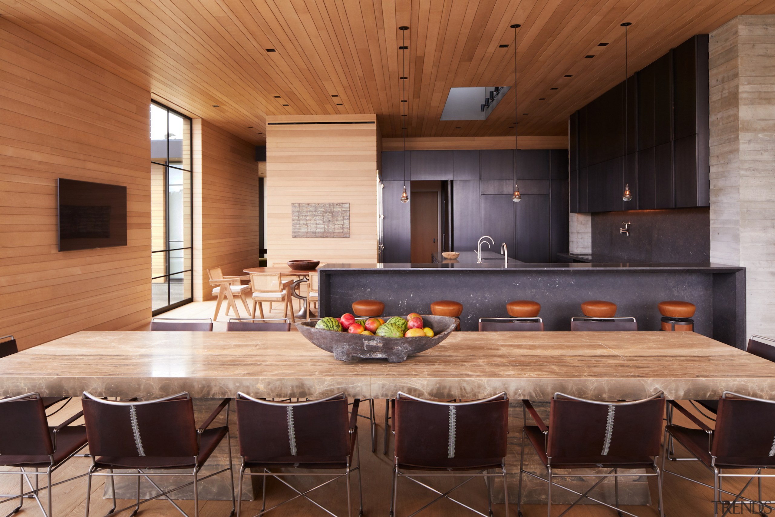 The home's substantial wood-lined kitchen and dining area. 