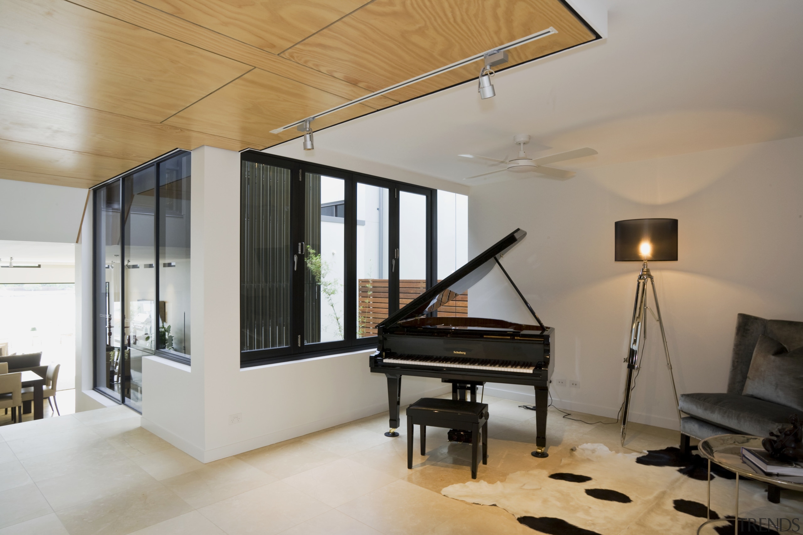 View of the Norman Reach development which is architecture, ceiling, floor, flooring, house, interior design, living room, piano, real estate, room, window, gray