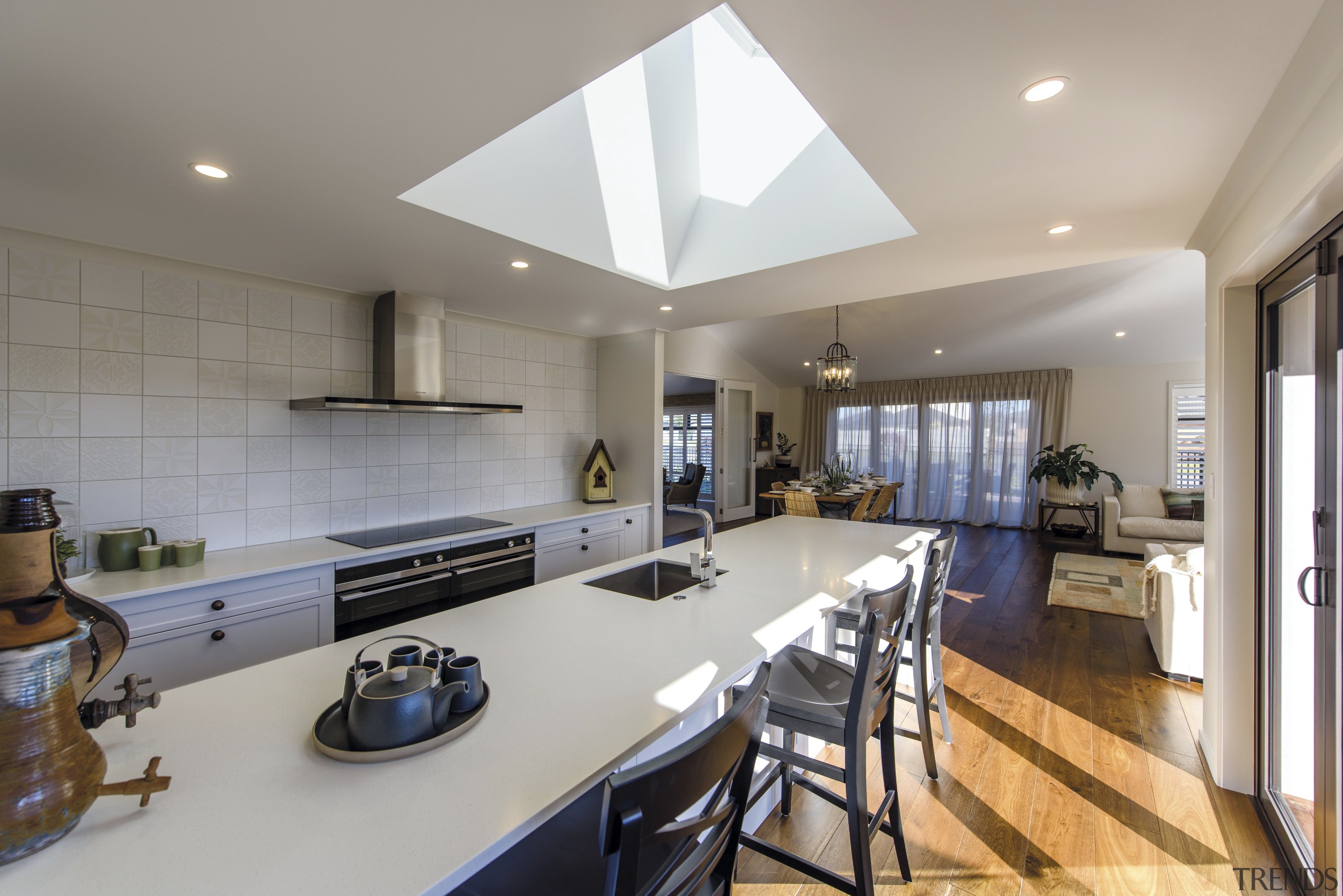 The kitchen in this Tauranga GJ Gardner showhome countertop, interior design, kitchen, real estate, room, gray