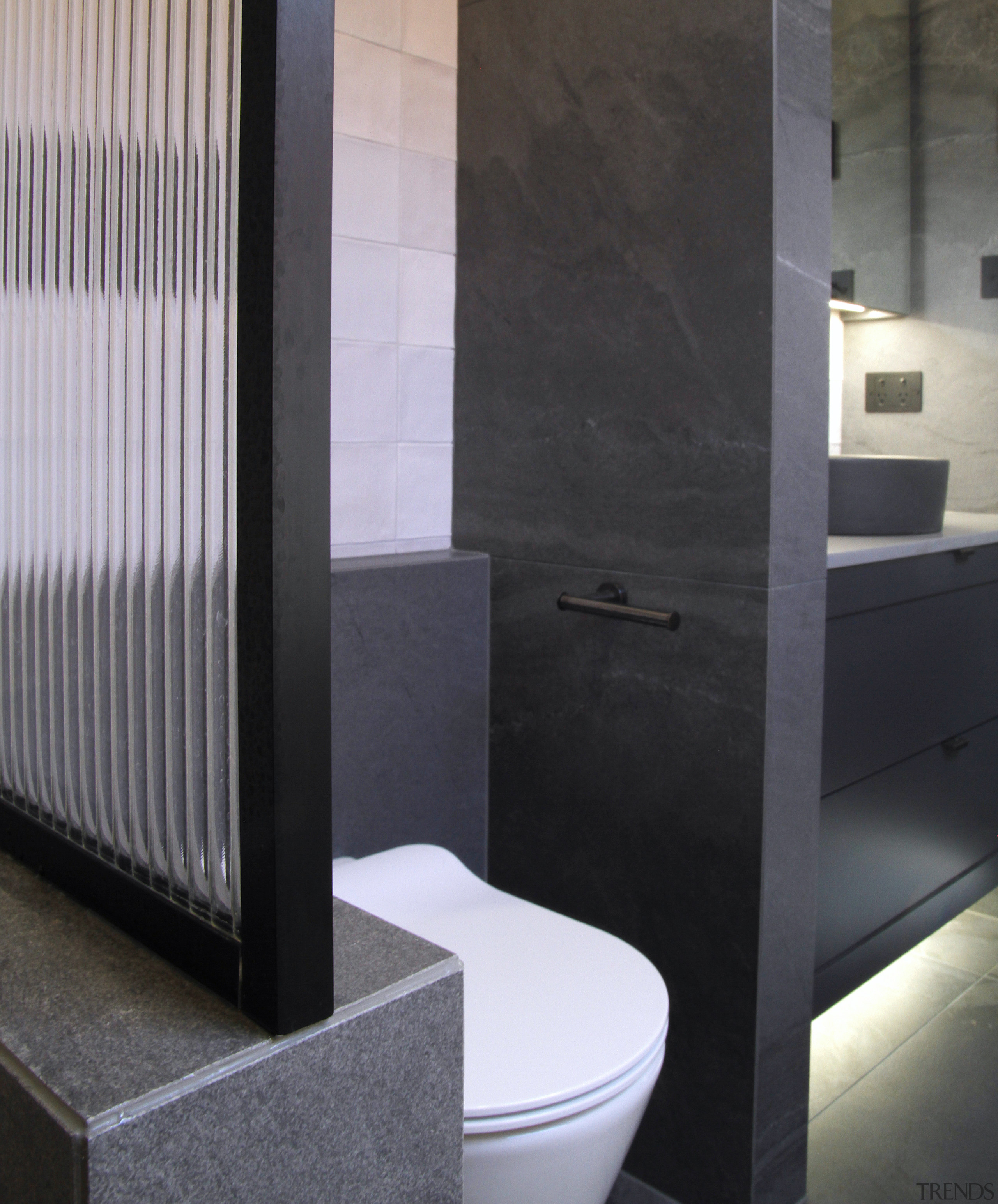 Large format tiles in a smokey grey contrast 