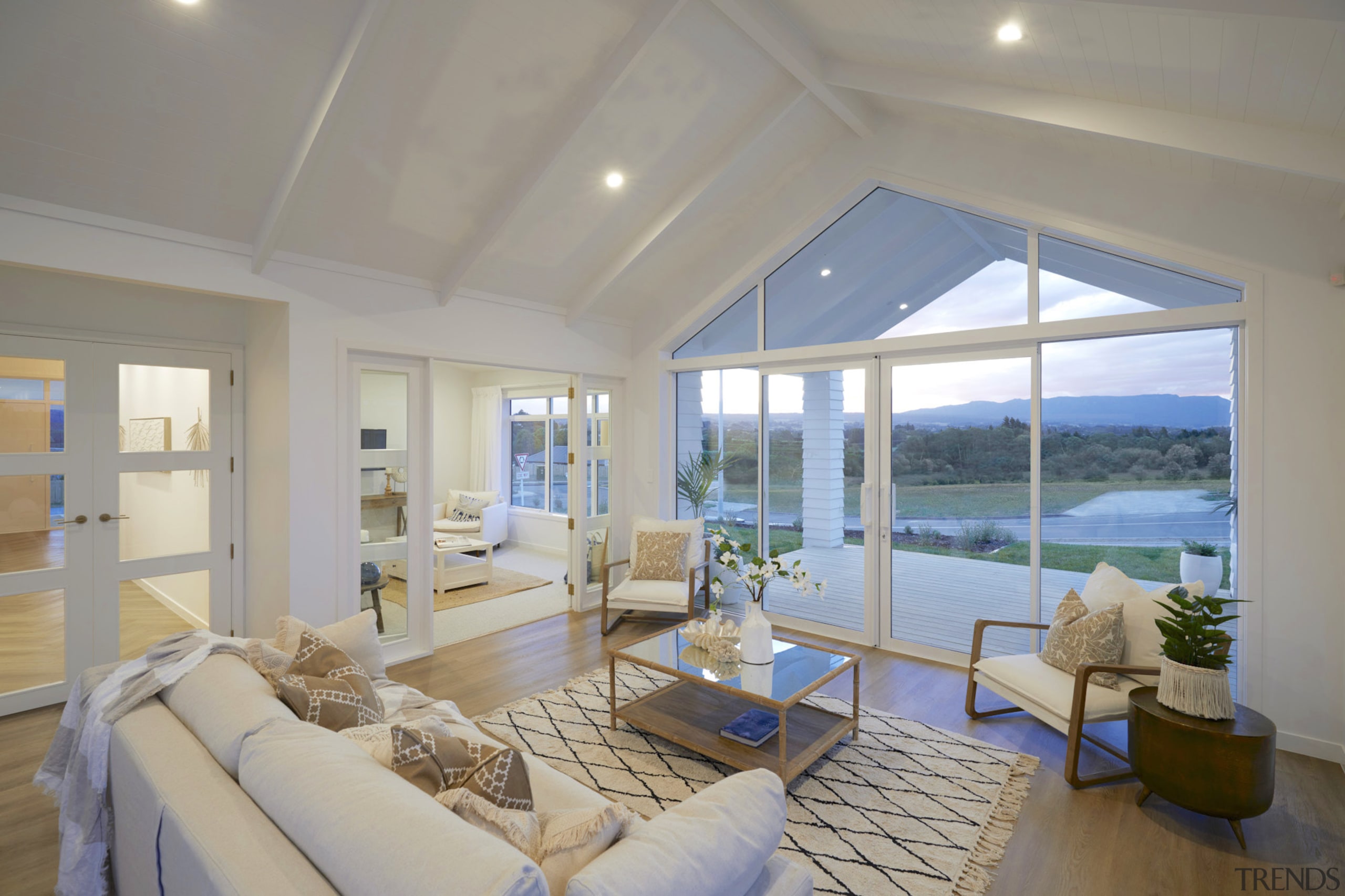 The gabled roofline translates into a soaring ceiling 