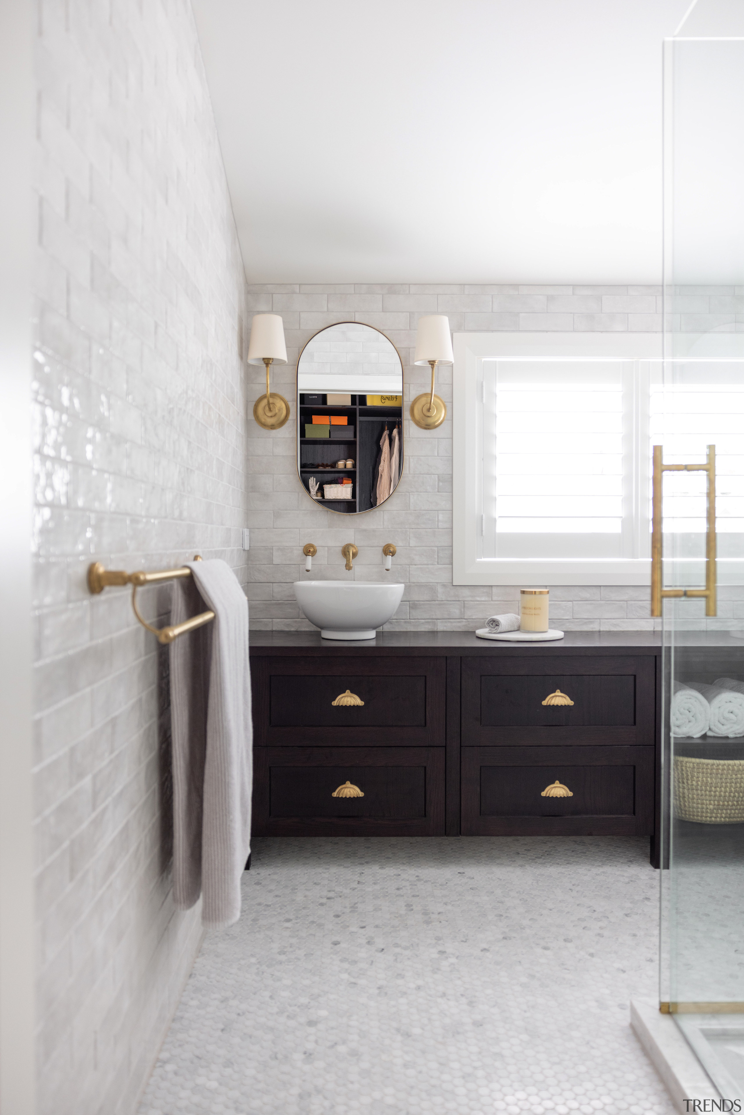 The bright, white, sheeny master bathroom. - Trajectory 