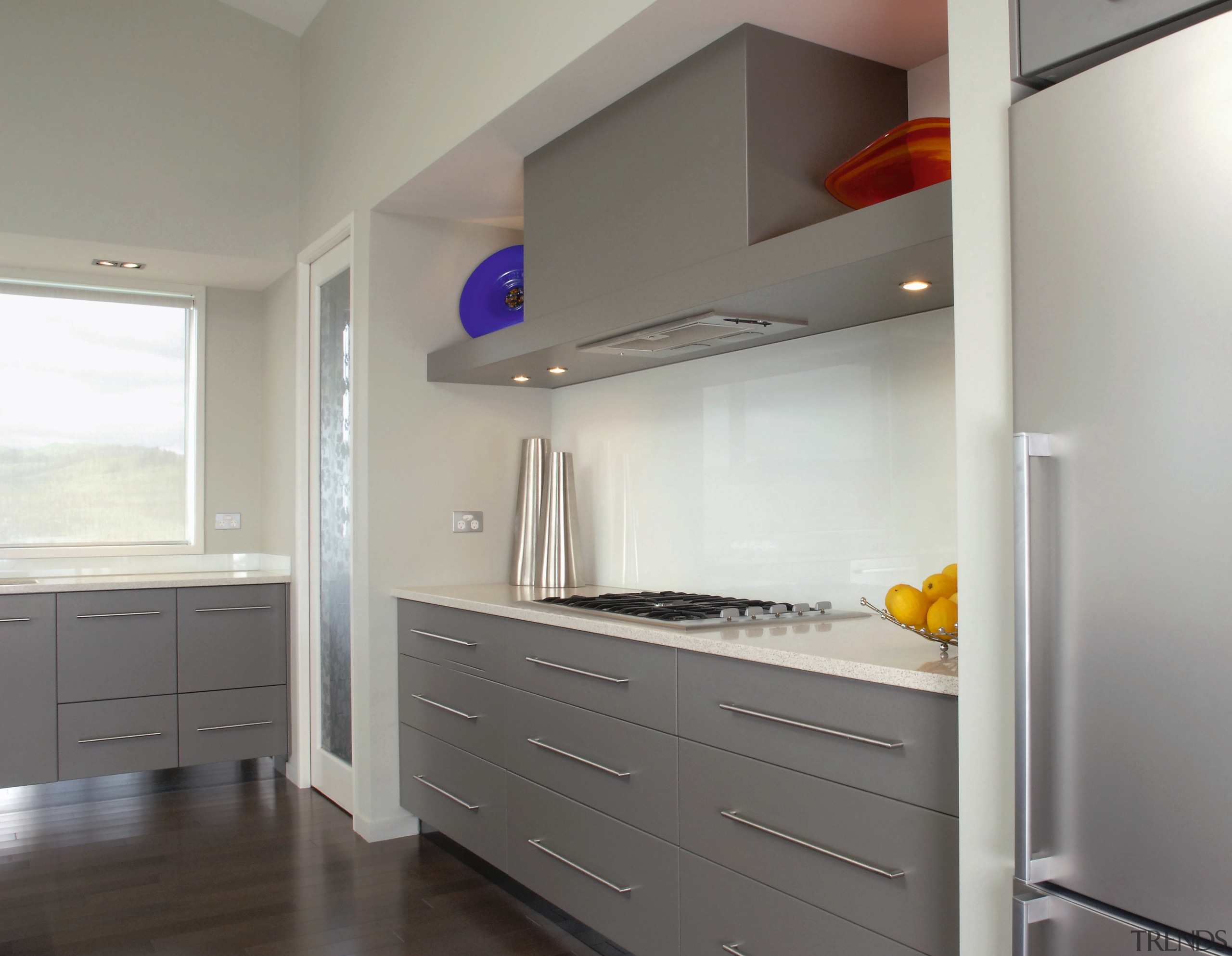 A view of a kitchen by Design House cabinetry, countertop, home appliance, interior design, kitchen, real estate, room, gray