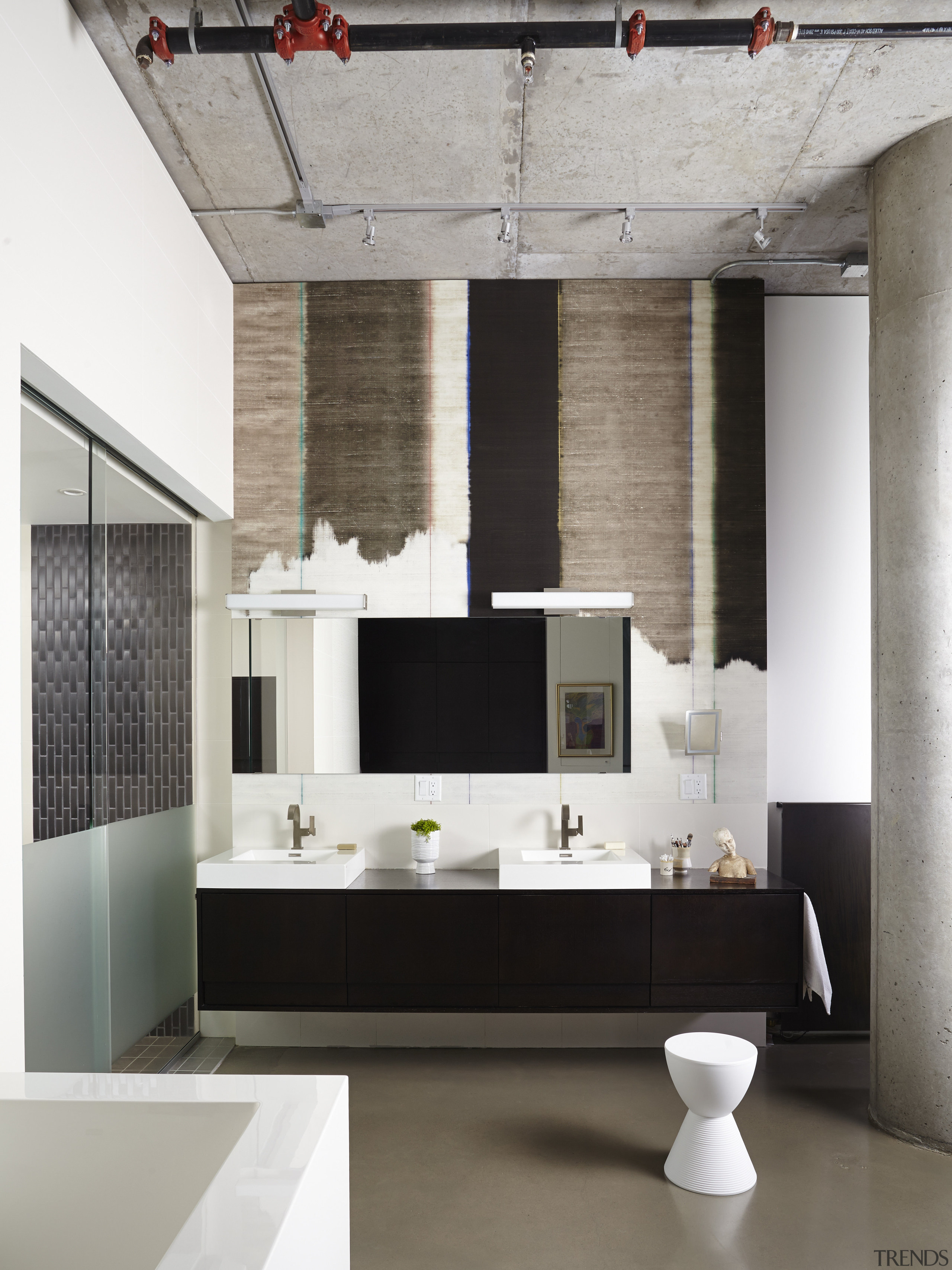 Designer distressed wallpaper hung behind the vanity brings floor, flooring, furniture, interior design, living room, wall, gray