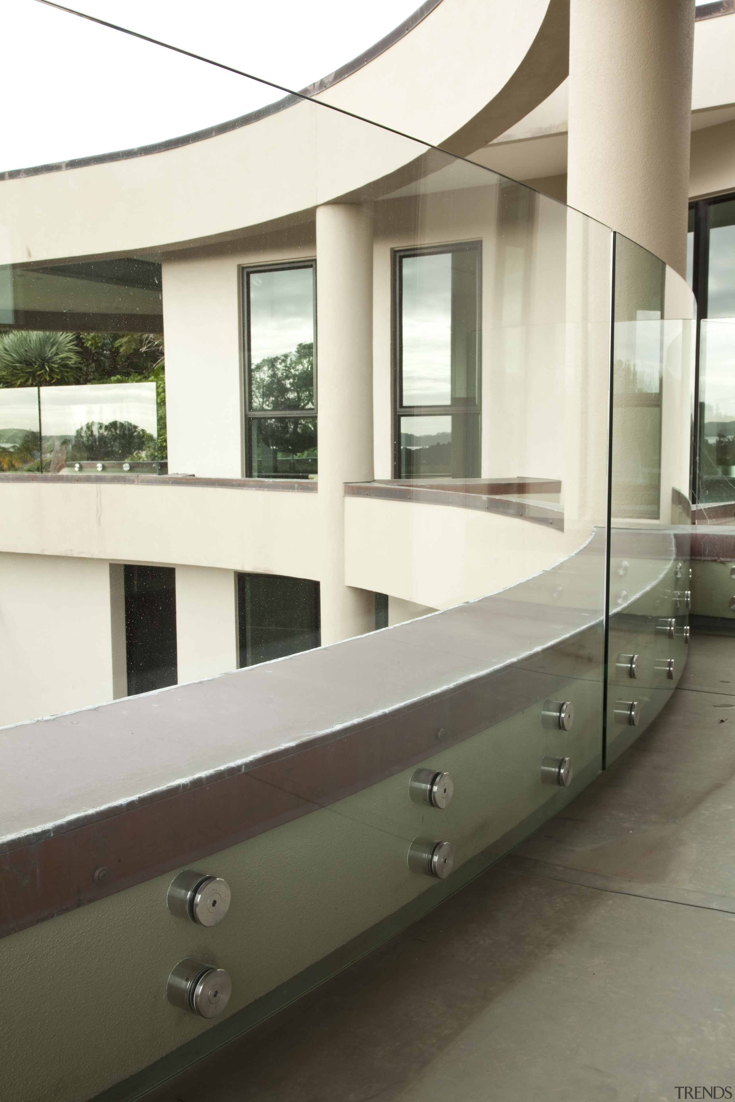 View of home with curved, toughened glass balustrade. architecture, glass, window, white, brown