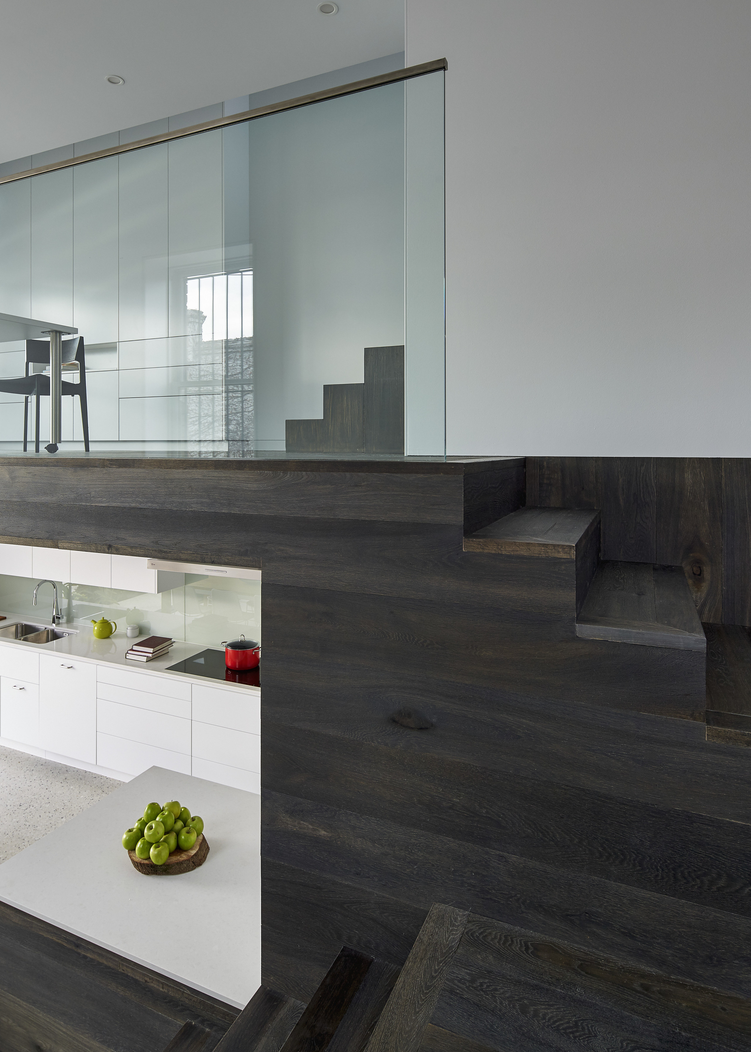 This modern new kitchen, designed by architect Julie architecture, floor, flooring, furniture, glass, house, interior design, product design, table, wood, gray, black