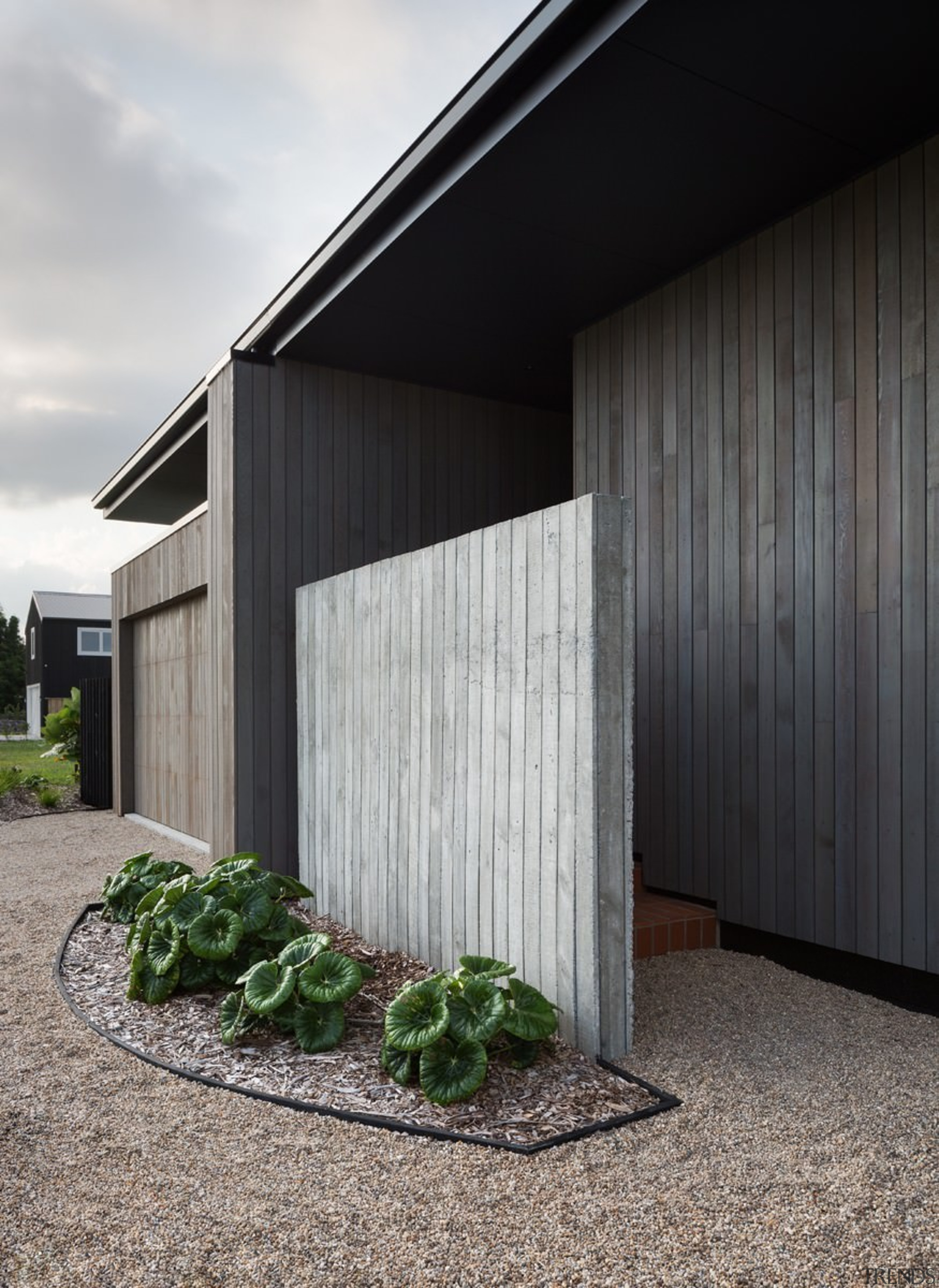 A secluded entryway is another private element - architecture, building, facade, house, real estate, siding, gray, black