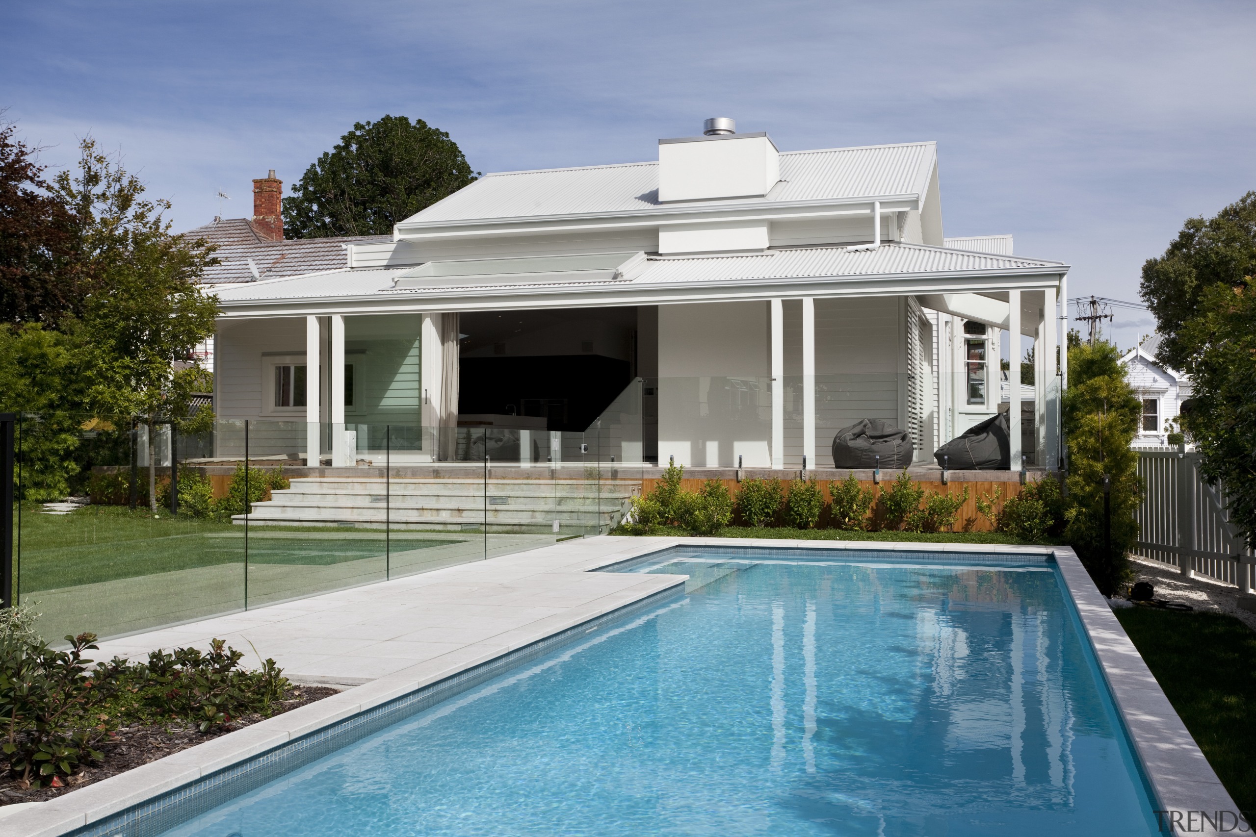 Wide steps lead down from the new additon architecture, estate, facade, home, house, mansion, property, real estate, residential area, roof, swimming pool, villa, window, teal