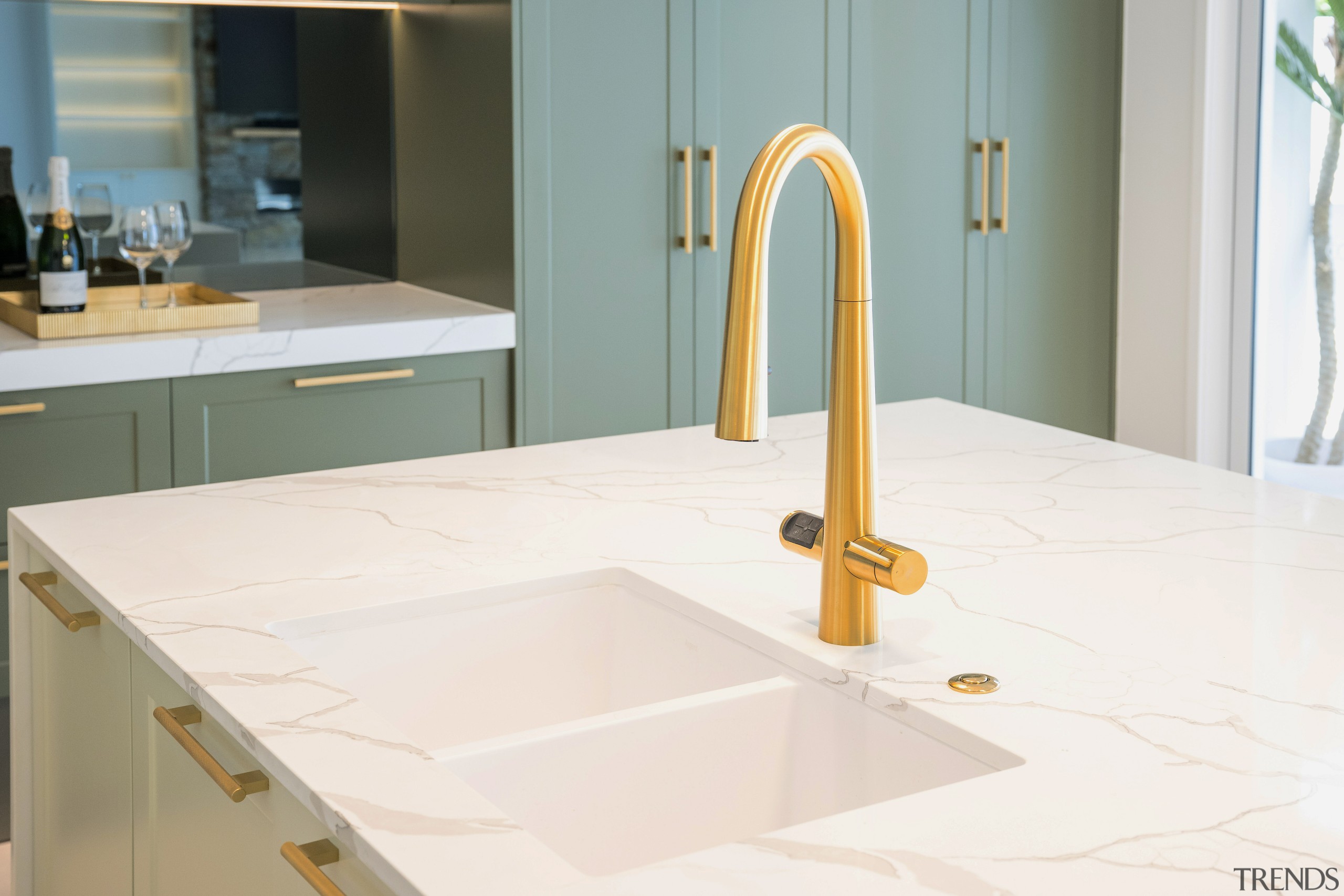 Brass tapware and hardware introduce a controlled warmth 