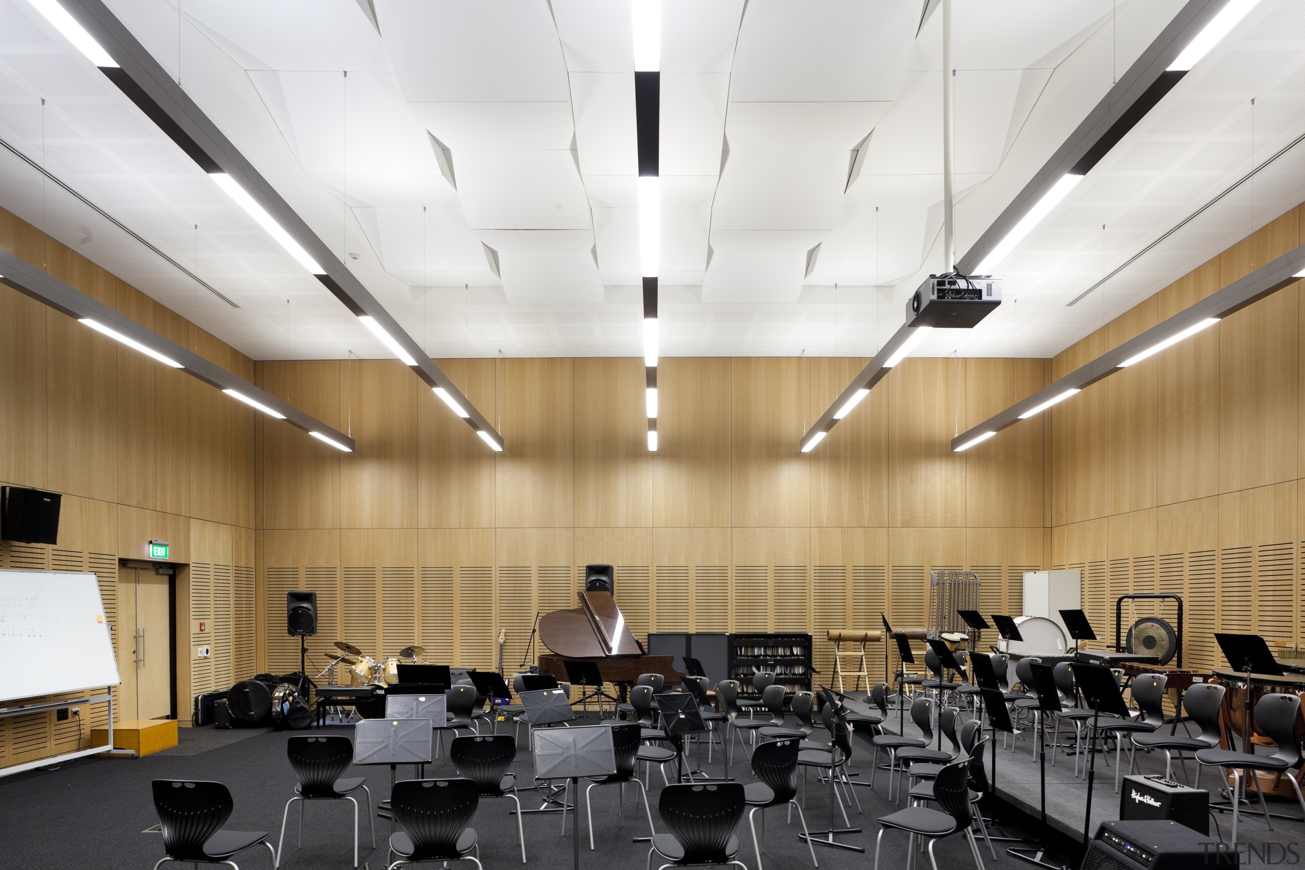 Room with wooden walls, black flooring and black architecture, auditorium, ceiling, classroom, conference hall, daylighting, interior design, white