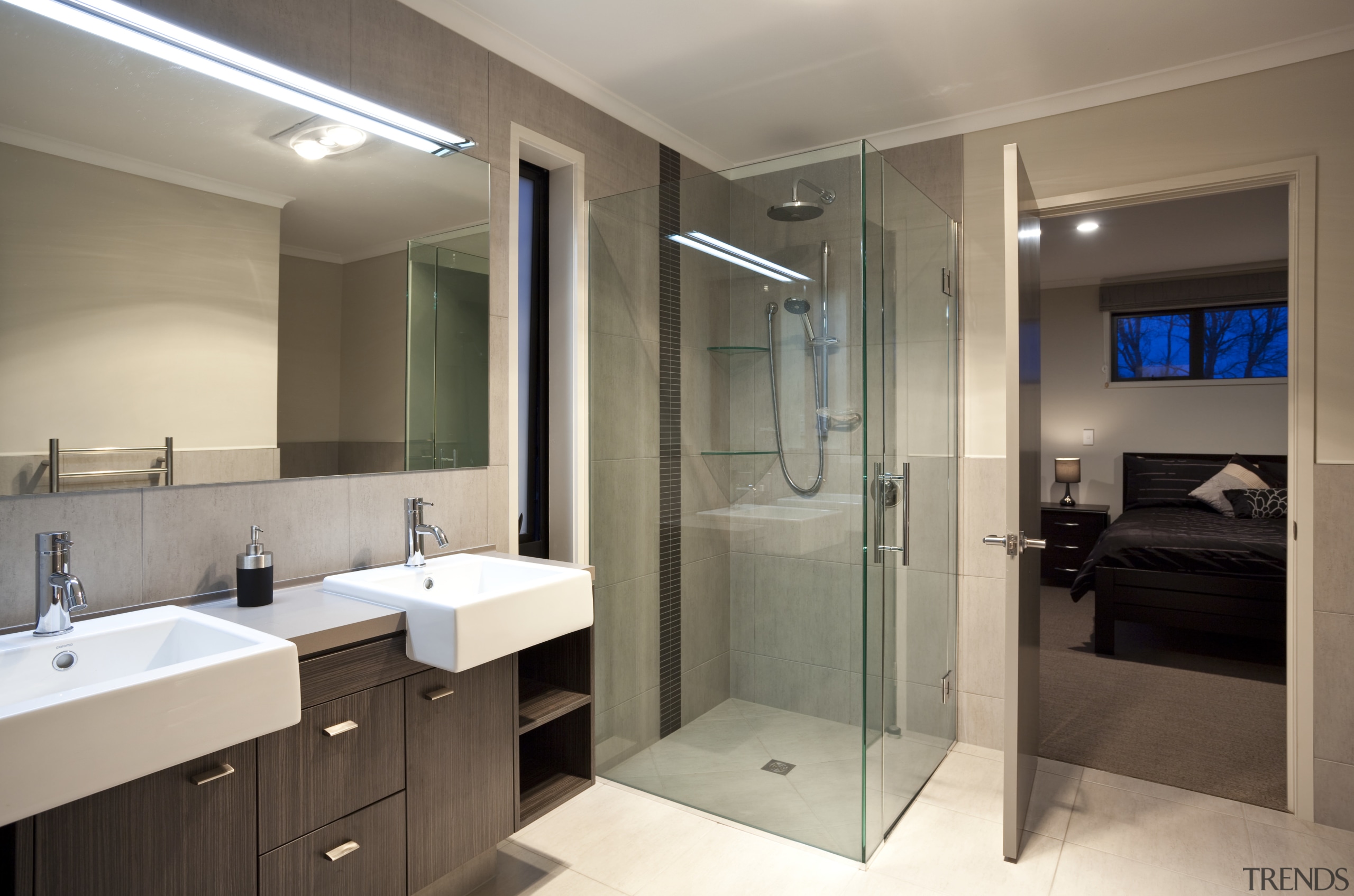 View of neutral toned bathroom with dark vanity bathroom, interior design, real estate, room, gray, brown