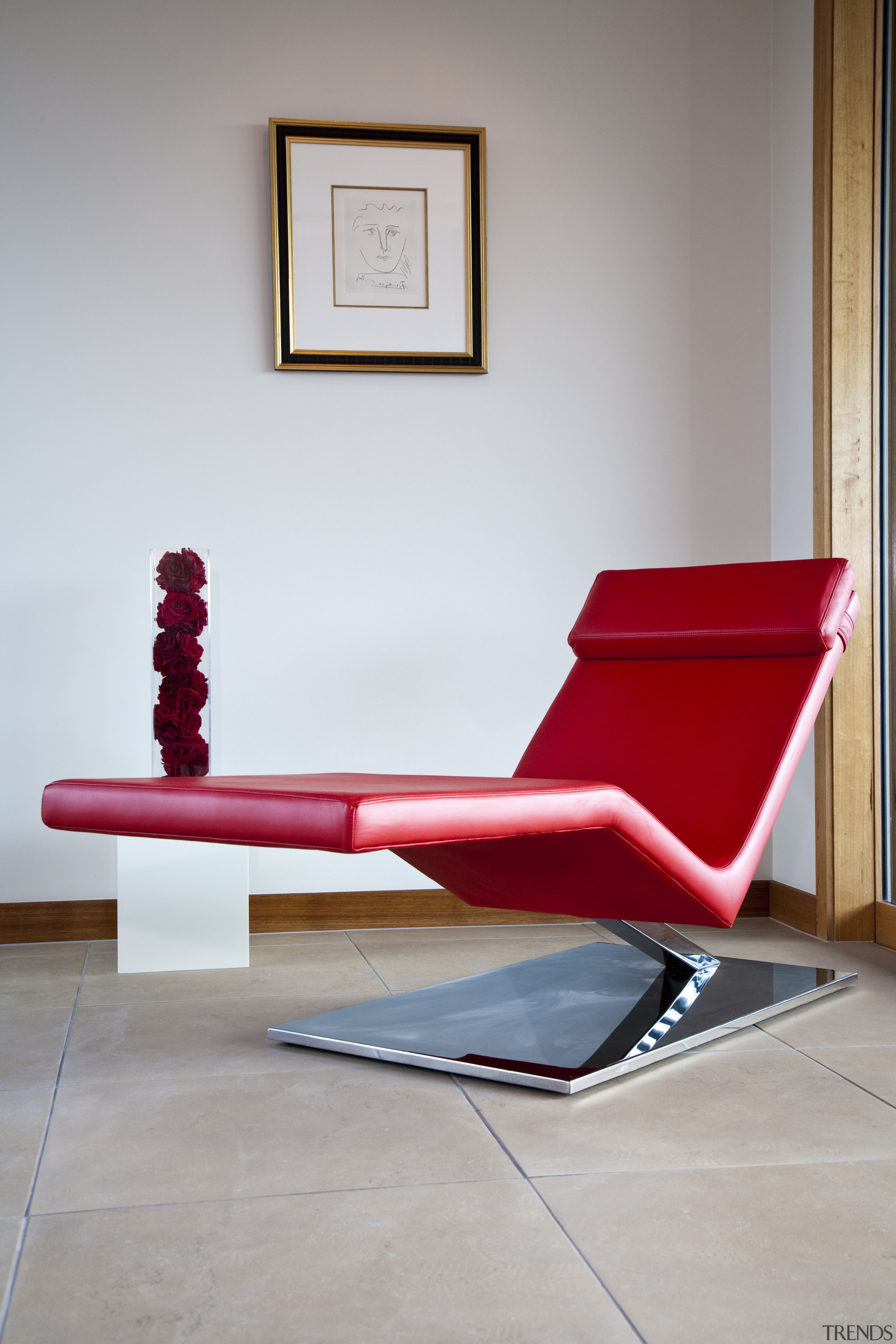 View of living area which features leather lounger chair, chaise longue, couch, floor, furniture, interior design, outdoor furniture, product design, red, table, gray