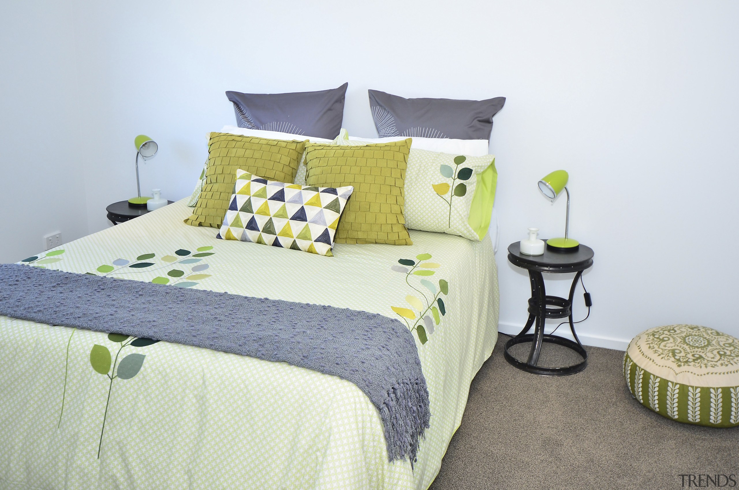 Seen here is a David Reid show home. bed, bed frame, bed sheet, bedding, bedroom, duvet cover, furniture, home, interior design, linens, product, room, textile, yellow, white