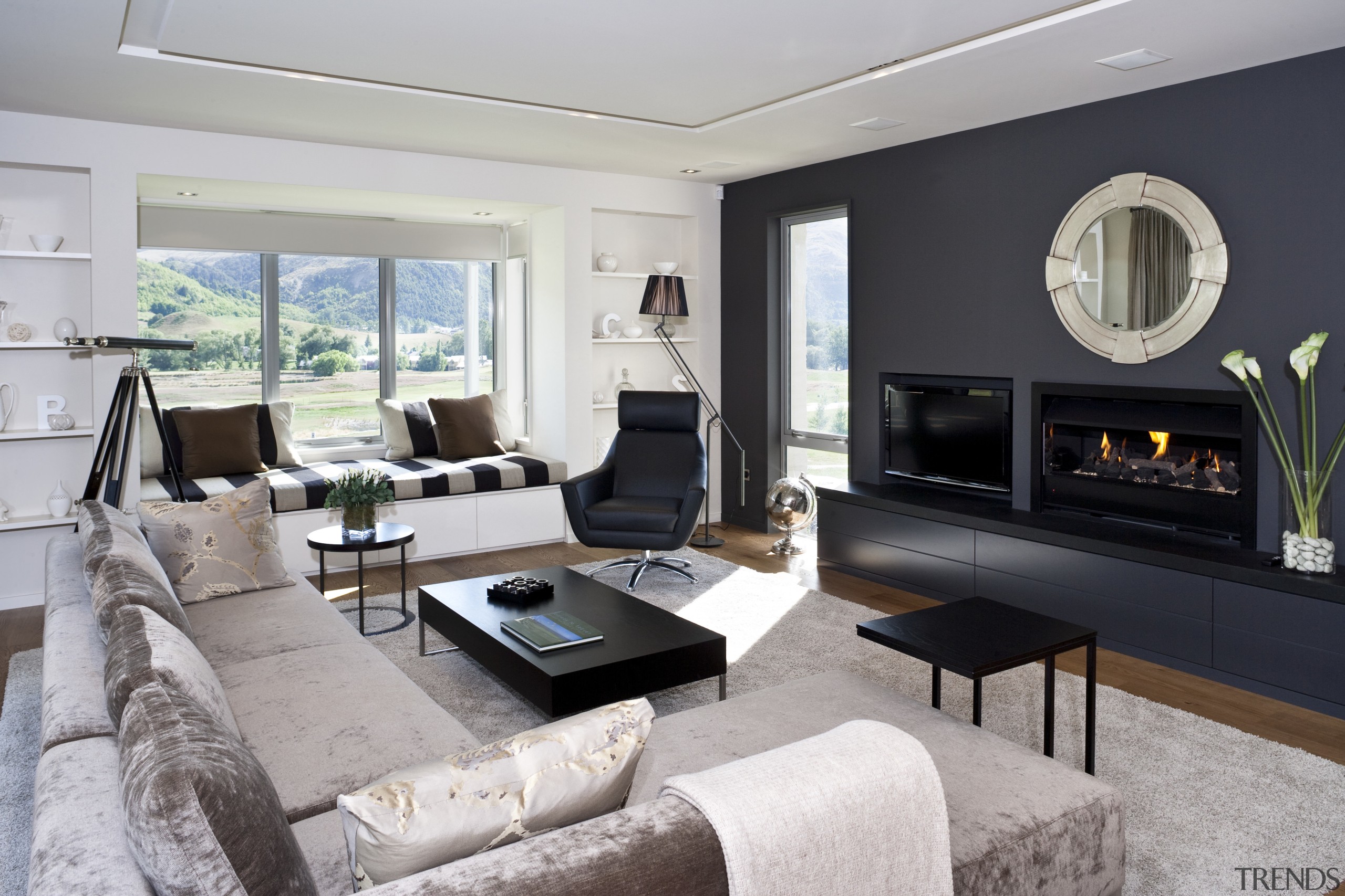 View of the lounge which features oak flooring, home, interior design, living room, real estate, room, gray, black