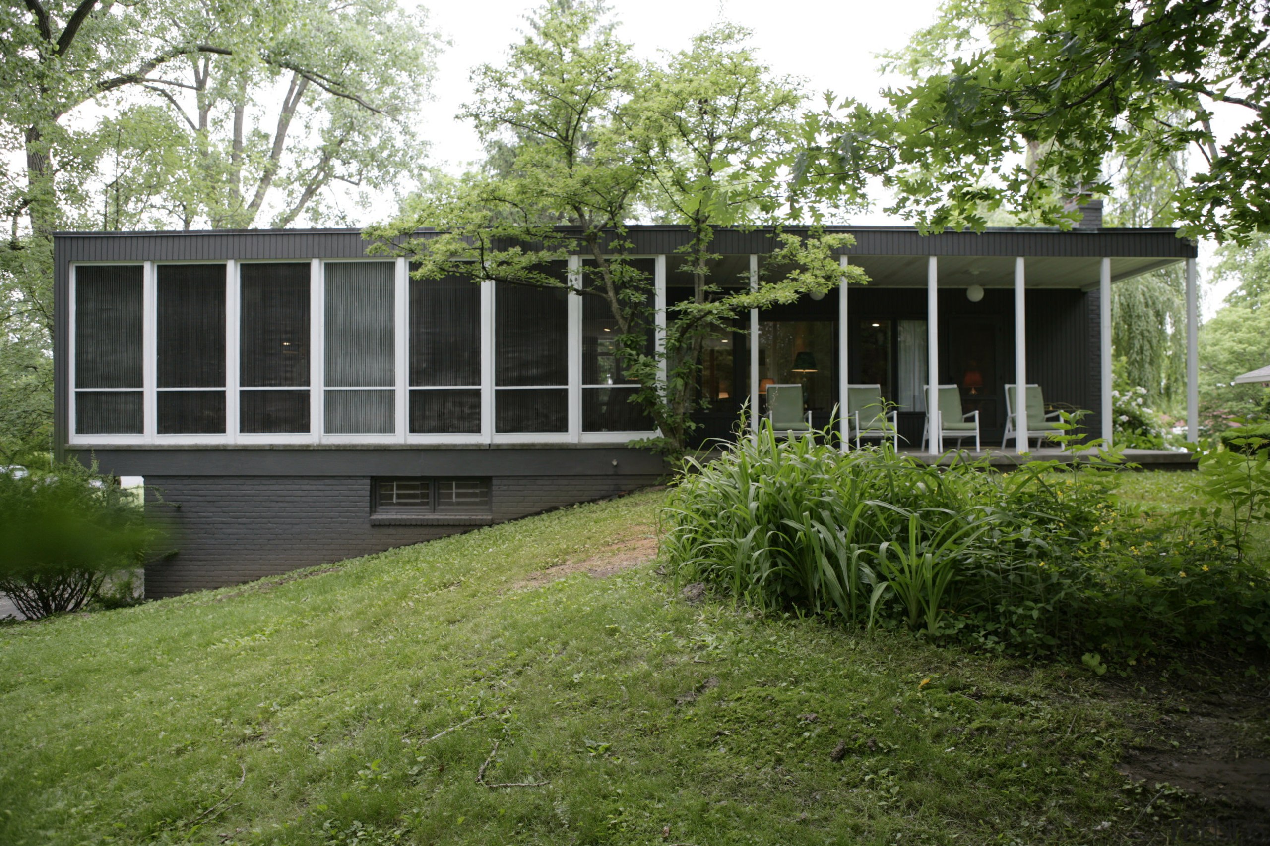 Exterior View of this home - Exterior View architecture, backyard, cottage, facade, farmhouse, grass, home, house, outdoor structure, porch, property, real estate, siding, yard, green